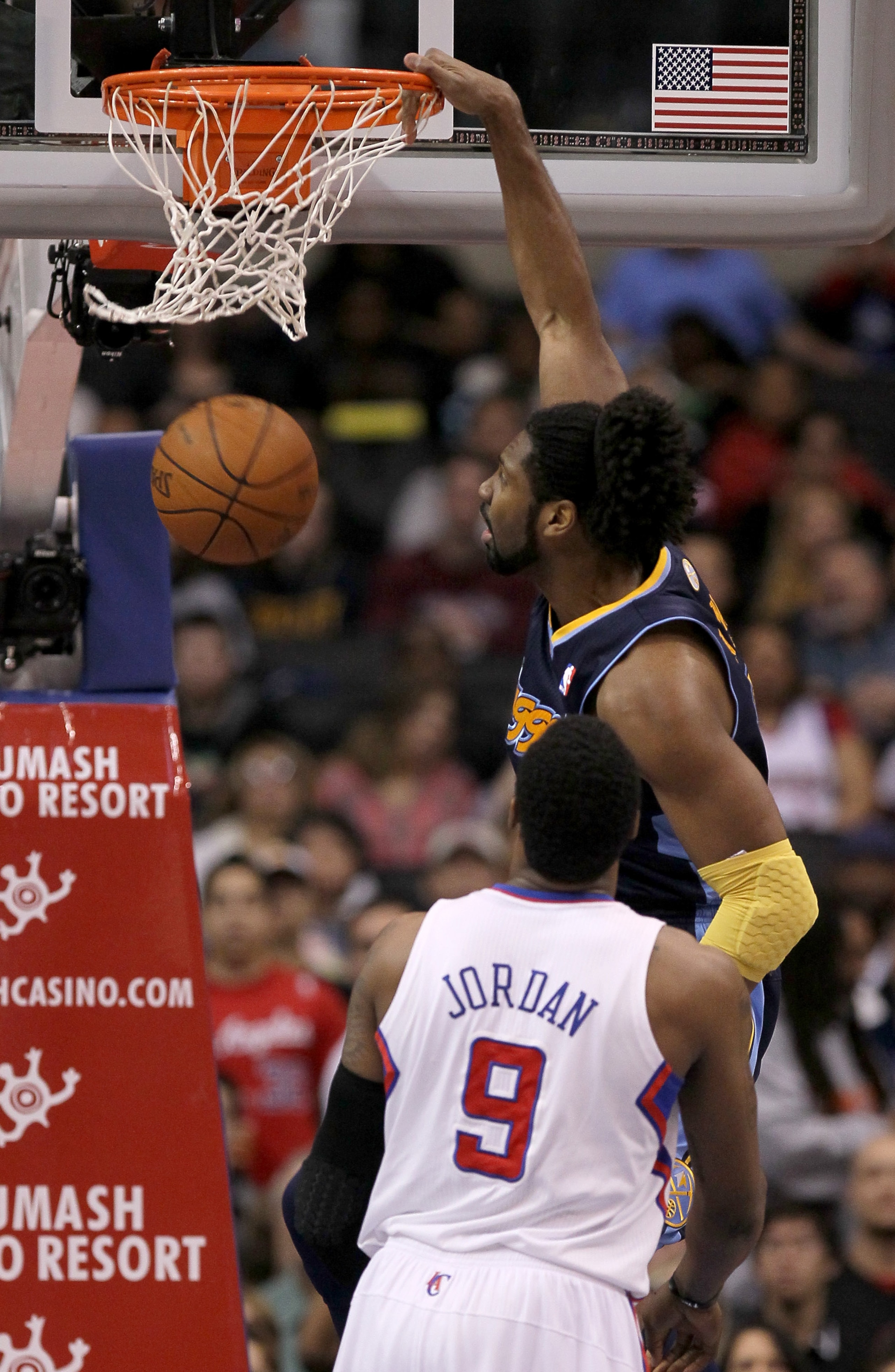 LOS ANGELES, CA - MARCH 5:  Nene #31 of the Denver Nuggets dunks over DAndre Jordan #9 of the Los Angeles Clippers at Staples Center on March 5, 2011 in Los Angeles, California.  NOTE TO USER: User expressly acknowledges and agrees that, by downloading an