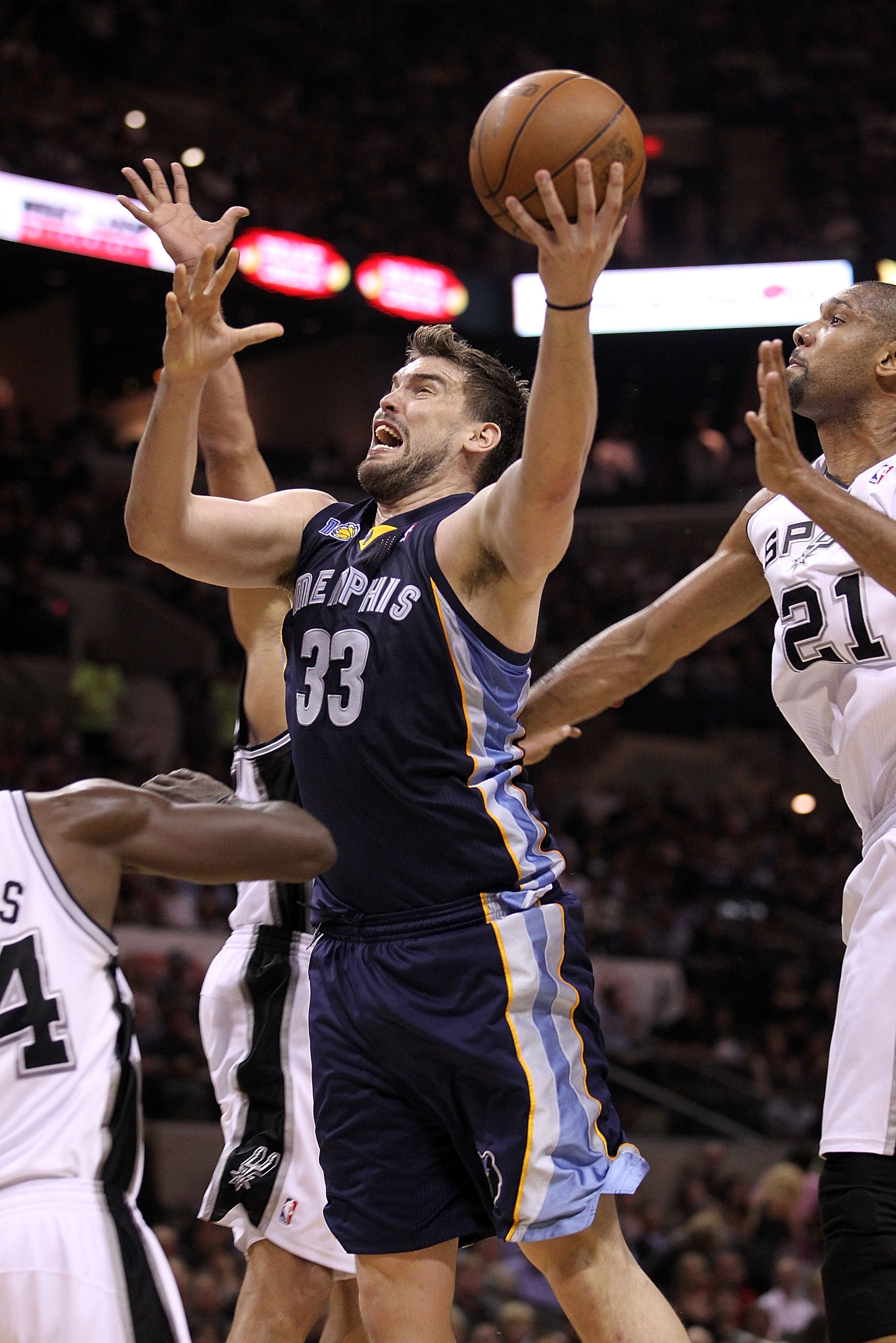 SAN ANTONIO, TX - APRIL 20: Center Marc Gasol #33 of the Memphis Grizzlies takes a shot against Antonio McDyess #34 of the San Antonio Spurs in Game Two of the Western Conference Quarterfinals in the 2011 NBA Playoffs on April 20, 2011 at AT&T Center in SAN ANTONIO, TX - APRIL 20: Center Marc Gasol #33 of the Memphis Grizzlies takes a shot against Antonio McDyess #34 of the San Antonio Spurs in Game Two of the Western Conference Quarterfinals in the 2011 NBA Playoffs on April 20, 2011 at AT&T Center in