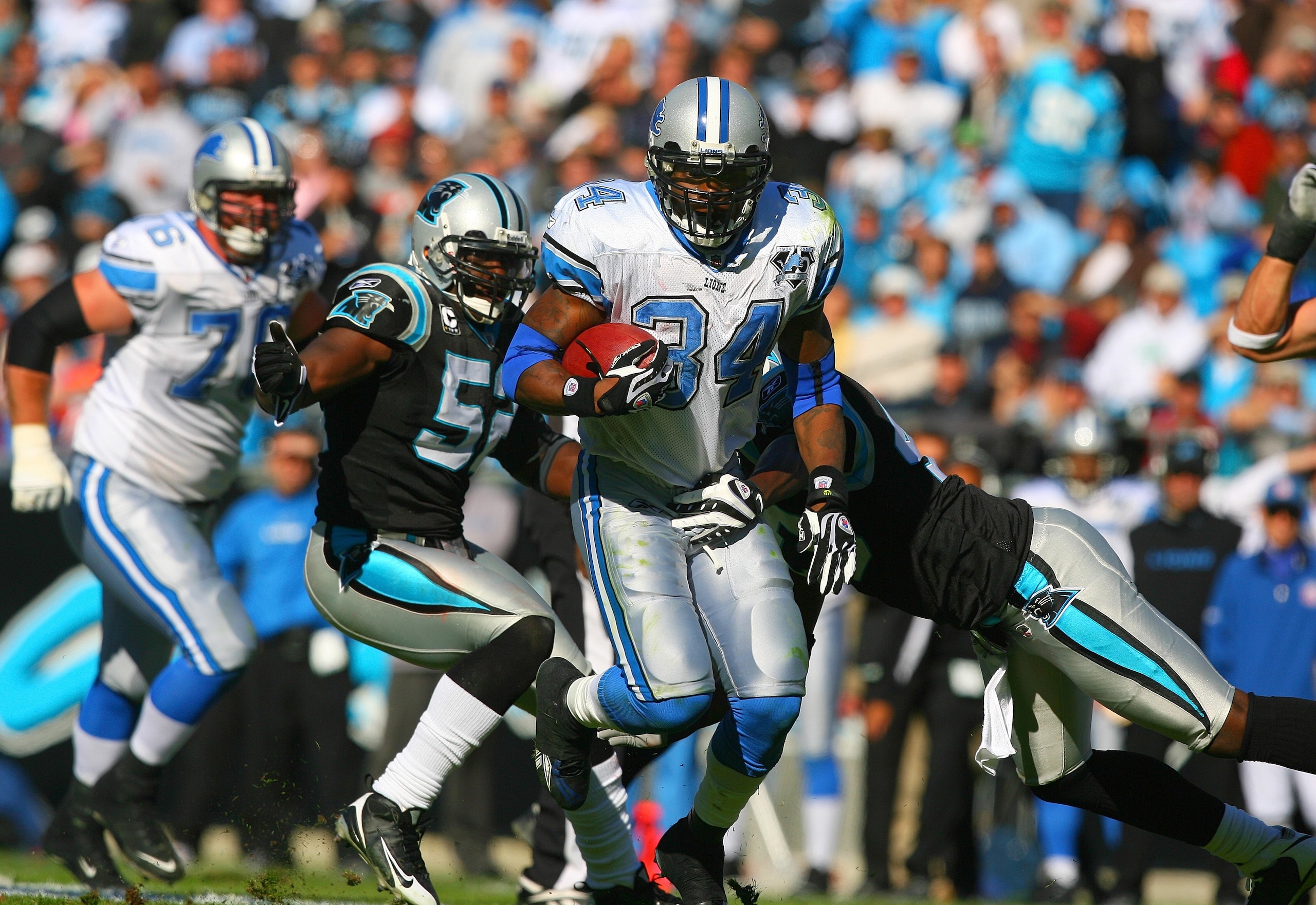 CHARLOTTE, NC - NOVEMBER 16:  Kevin Smith #34 of the Detroit Lions runs with the ball during their NFL game against the Carolina Panthers at Bank of America Stadium on November 16, 2008  in Charlotte, North Carolina. The Panthers defeated the Lions 31-22.
