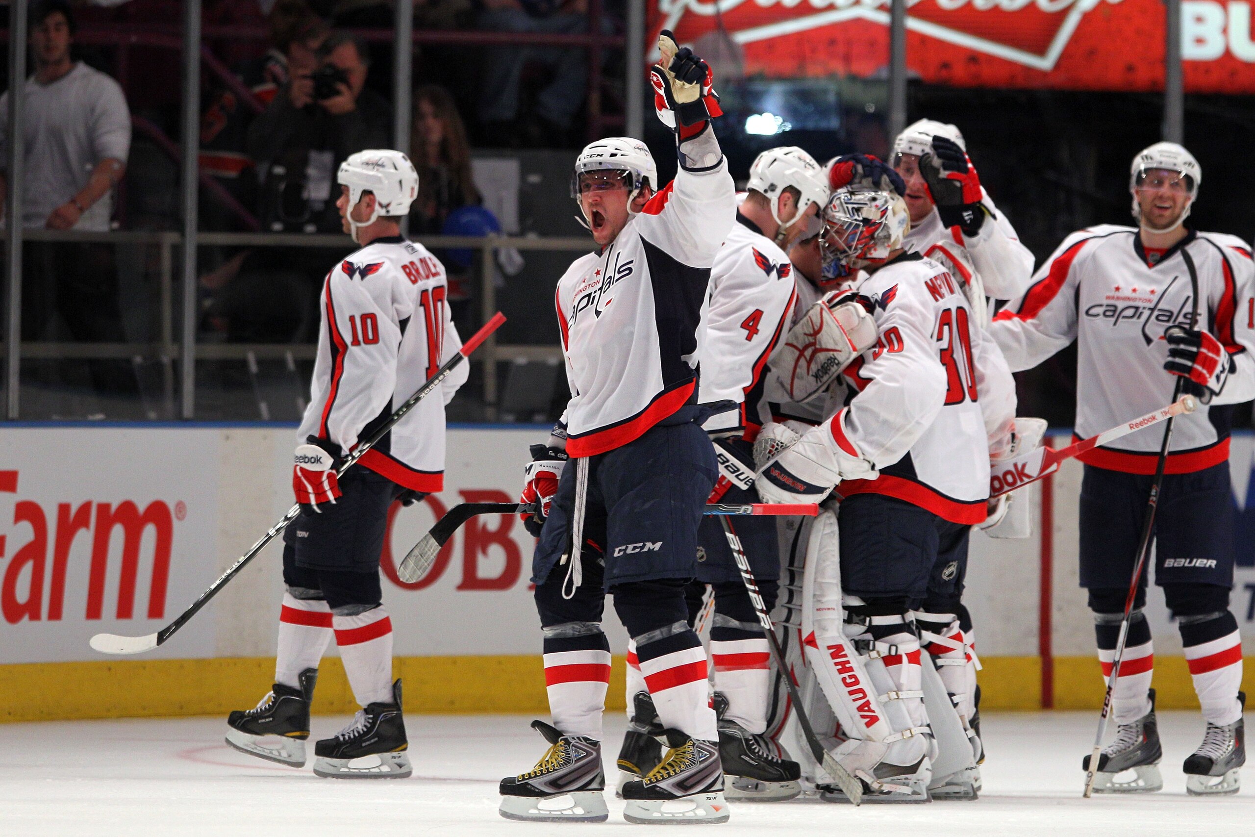 NEW YORK, NY - APRIL 20:  Alex Ovechkin (C) #8 of the Washington Capitals celebrates with his teammates after they won 4-3 in double overtime against the New York Rangers in Game Four of the Eastern Conference Quarterfinals during the 2011 NHL Stanley Cup