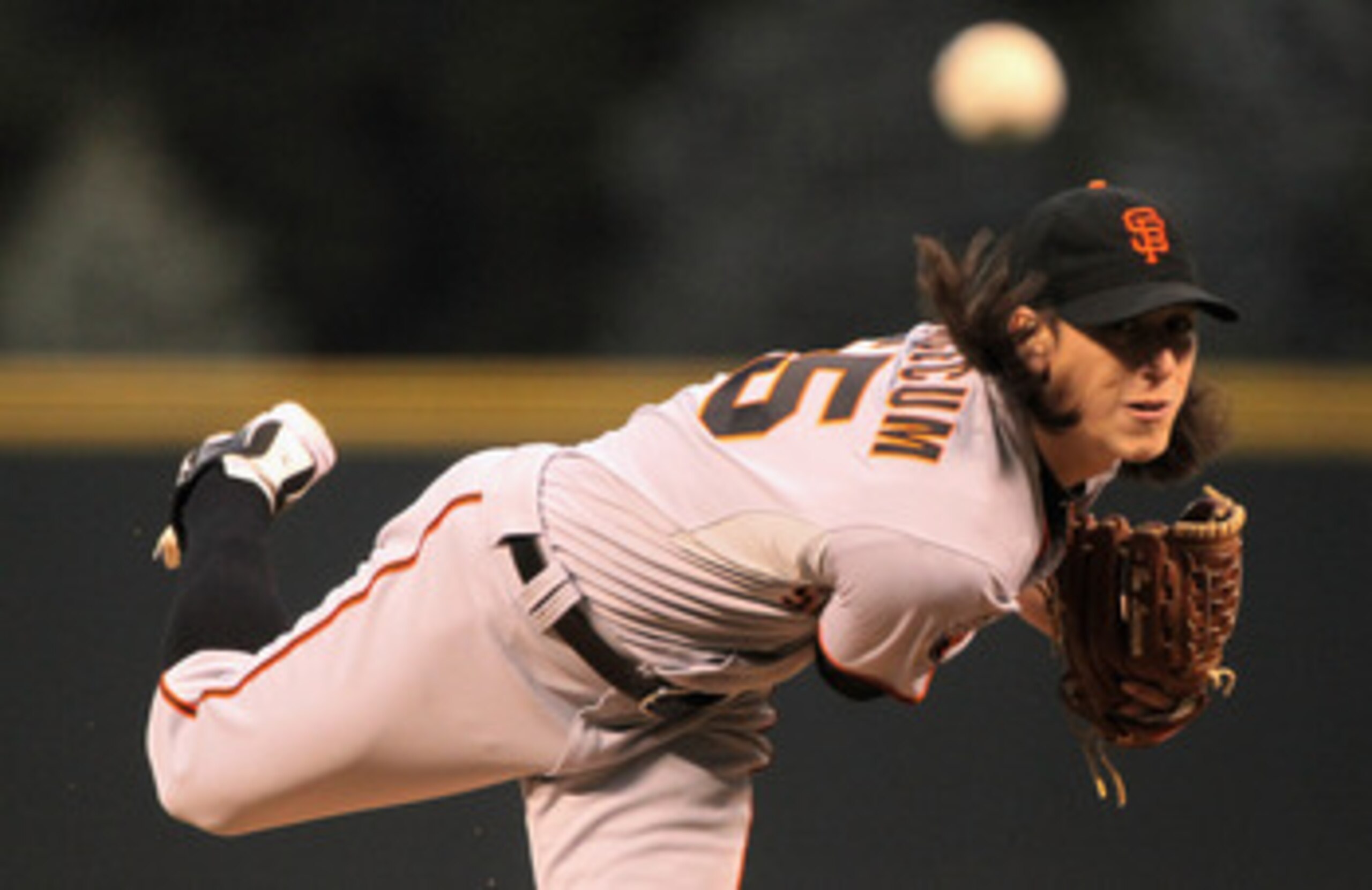 DENVER, CO - APRIL 18: Starting pitcher Tim Lincecum #55 of the San Francisco Giants works against the Colorado Rockies at Coors Field on April 18, 2011 in Denver, Colorado. Lincecum recorded 10 strike outs as he earned the win as the Giants defeated the DENVER, CO - APRIL 18: Starting pitcher Tim Lincecum #55 of the San Francisco Giants works against the Colorado Rockies at Coors Field on April 18, 2011 in Denver, Colorado. Lincecum recorded 10 strike outs as he earned the win as the Giants defeated the