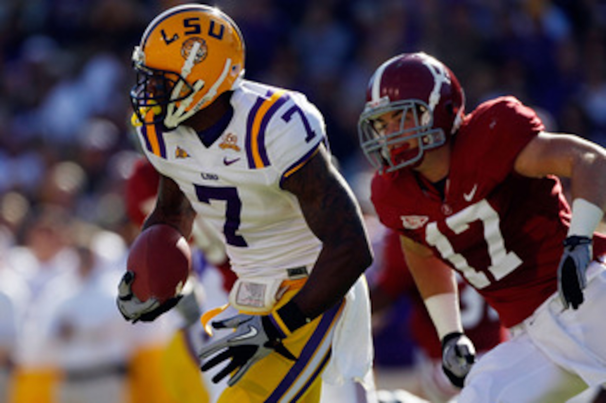 BATON ROUGE, LA - NOVEMBER 06:  Patrick Peterson #7 of the Louisiana State University Tigers avoids a tackle by Brad Smelley #17 of the Alabama Crimson Tide  at Tiger Stadium on November 6, 2010 in Baton Rouge, Louisiana.  (Photo by Chris Graythen/Getty I