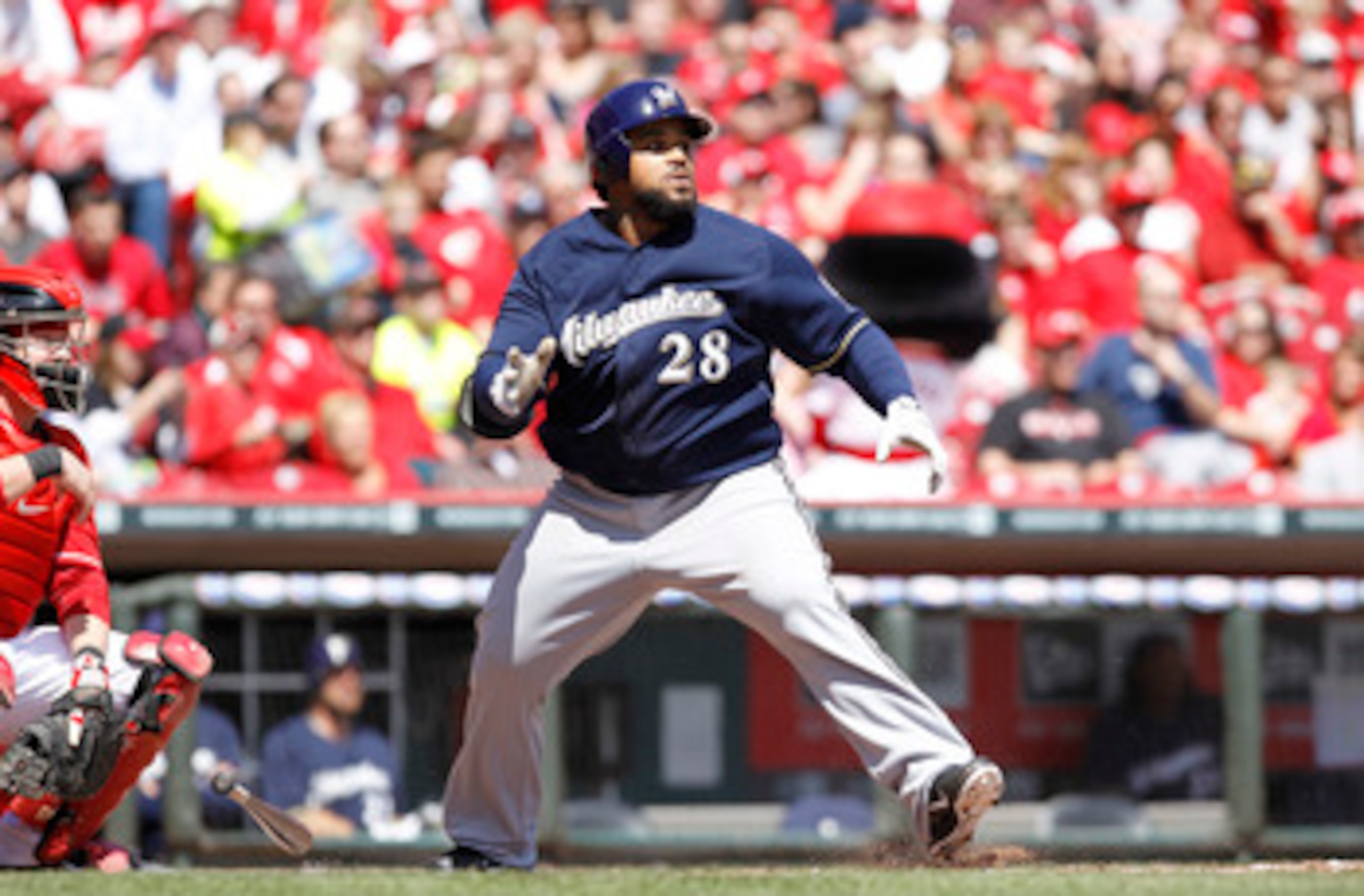 CINCINNATI, OH - APRIL 3: Prince Fielder #28 of the Milwaukee Brewers hits the ball against the Cincinnati Reds at Great American Ball Park on April 3, 2011 in Cincinnati, Ohio. The Reds won 12-3. (Photo by Joe Robbins/Getty Images)