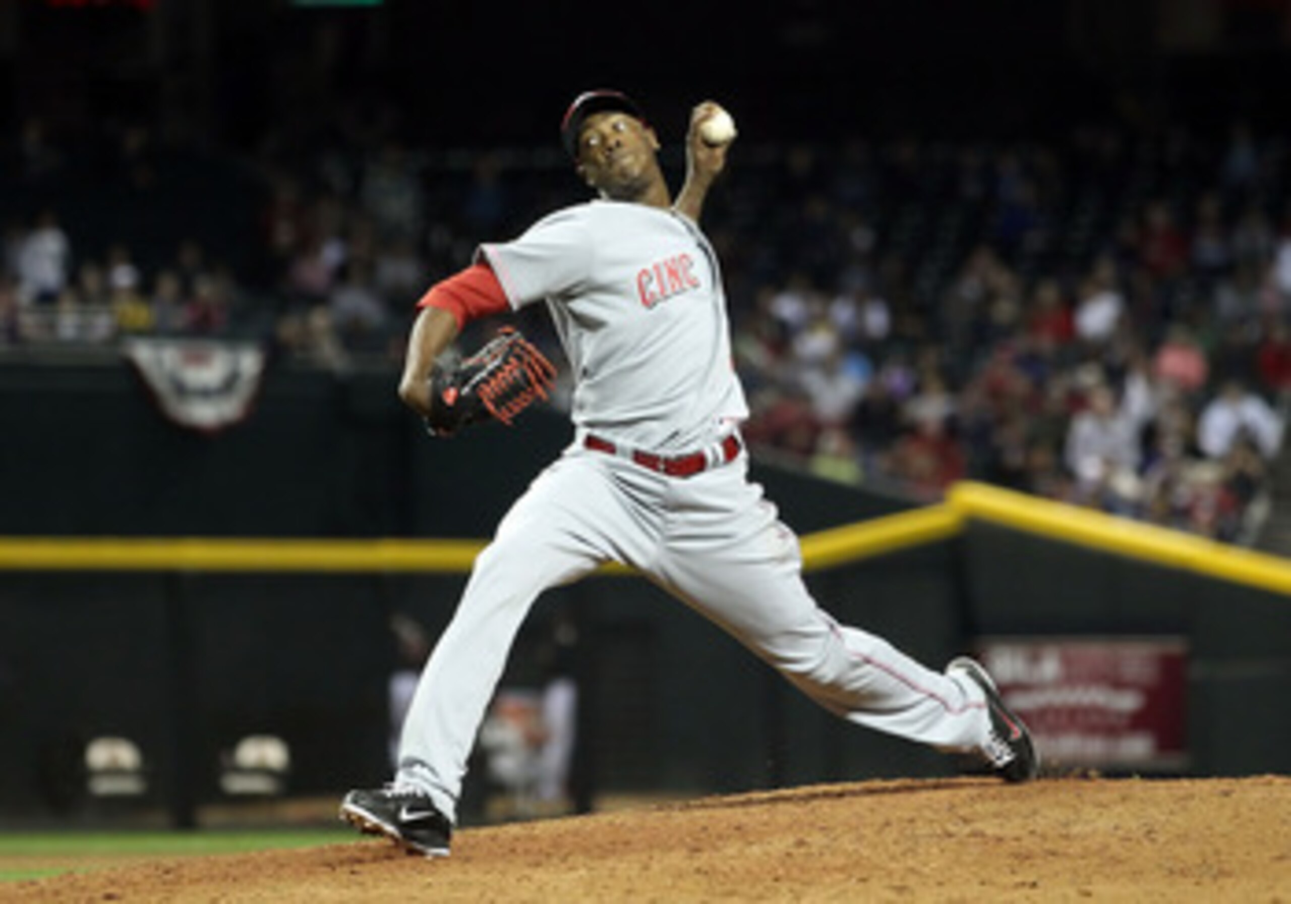 PHOENIX, AZ - APRIL 09:  Relief pitcher Aroldis Chapman #54 of the Cincinnati Reds pitches against the Arizona Diamondbacks during the Major League Baseball game at Chase Field on April 9, 2011 in Phoenix, Arizona.  The Reds defeated the Diamondbacks 6-1.