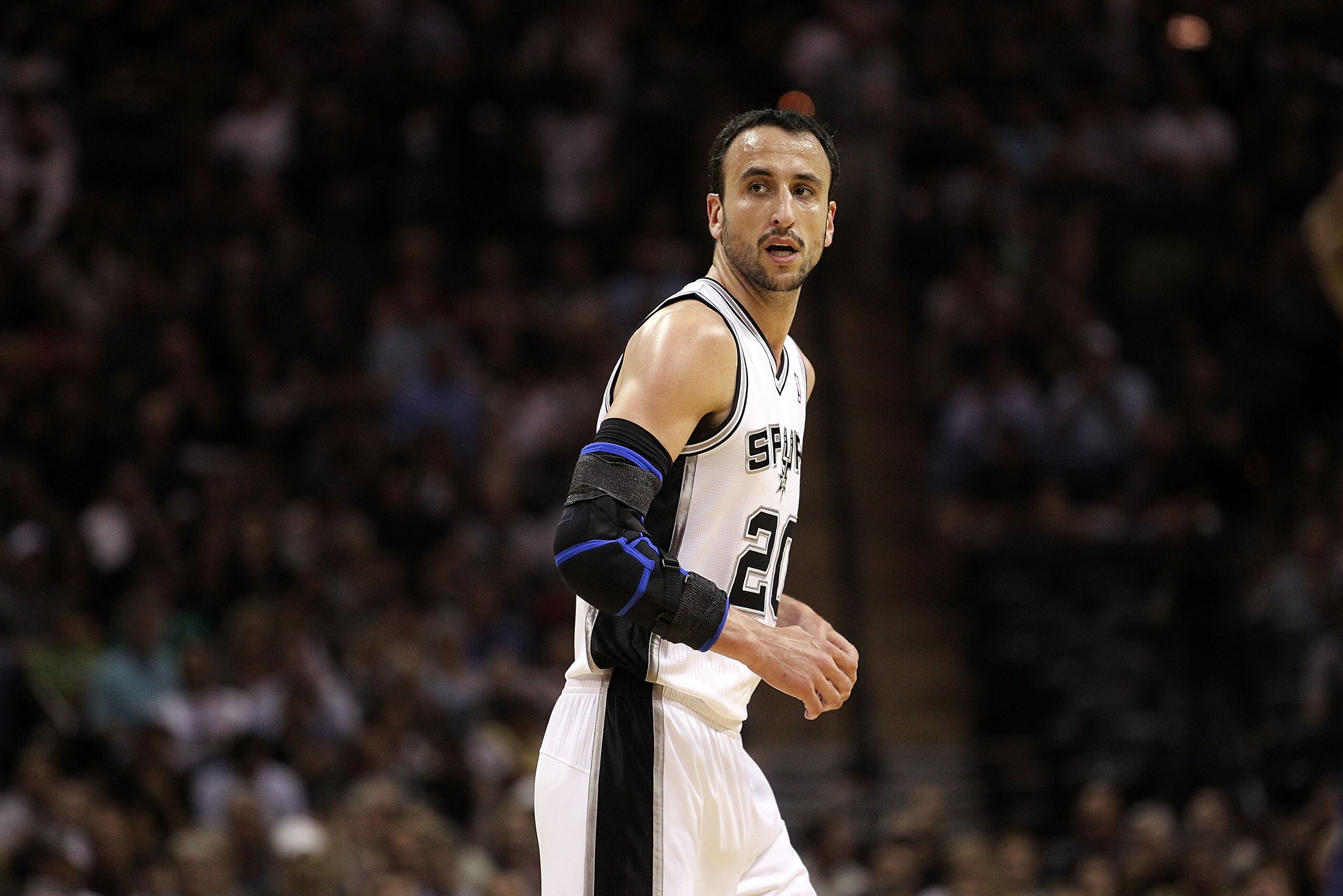 SAN ANTONIO, TX - APRIL 20: Guard Manu Ginobili #20 of the San Antonio Spurs against the Memphis Grizzlies in Game Two of the Western Conference Quarterfinals in the 2011 NBA Playoffs on April 20, 2011 at AT&T Center in San Antonio, Texas. NOTE TO USER: SAN ANTONIO, TX - APRIL 20: Guard Manu Ginobili #20 of the San Antonio Spurs against the Memphis Grizzlies in Game Two of the Western Conference Quarterfinals in the 2011 NBA Playoffs on April 20, 2011 at AT&T Center in San Antonio, Texas. NOTE TO USER: