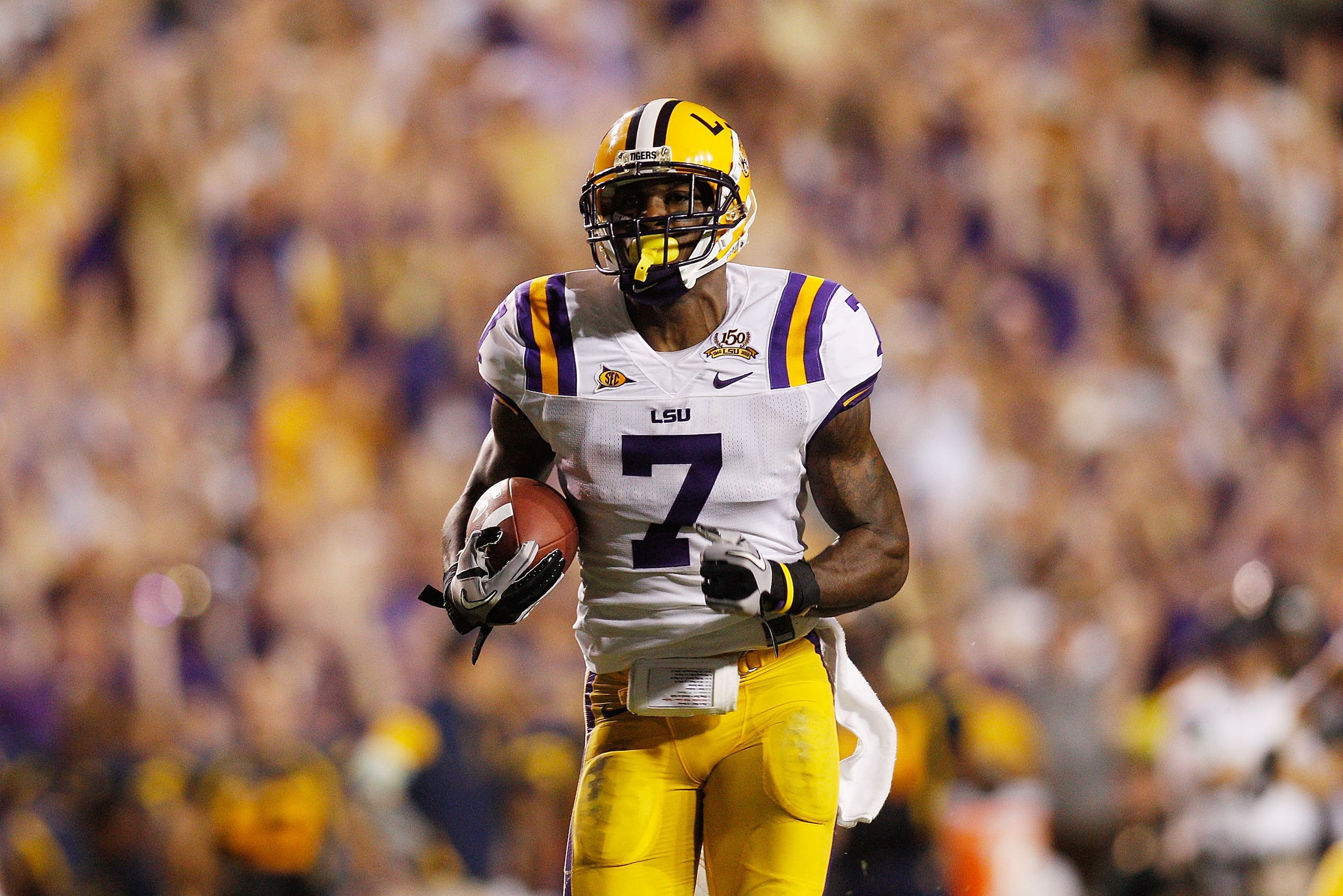 BATON ROUGE, LA - SEPTEMBER 25: Patrick Peterson #7 of the Louisiana State Univeristy Tigers runs for a touchdown against the West Virginia Mountaineers at Tiger Stadium on September 25, 2010 in Baton Rouge, Louisiana. (Photo by Chris Graythen/Getty Ima BATON ROUGE, LA - SEPTEMBER 25: Patrick Peterson #7 of the Louisiana State Univeristy Tigers runs for a touchdown against the West Virginia Mountaineers at Tiger Stadium on September 25, 2010 in Baton Rouge, Louisiana. (Photo by Chris Graythen/Getty Ima