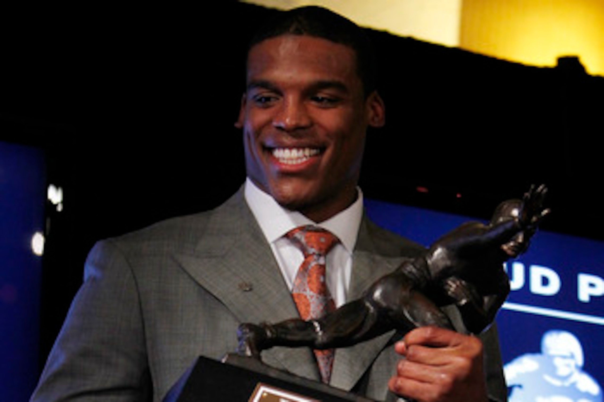 NEW YORK - DECEMBER 11:  Cam Newton, quarterback of the Auburn University Tigers, speaks after being awarded the 2010 Heisman Memorial Trophy Award on December 11, 2010 in New York City.  (Photo by Jeff Zelevansky/Getty Images)