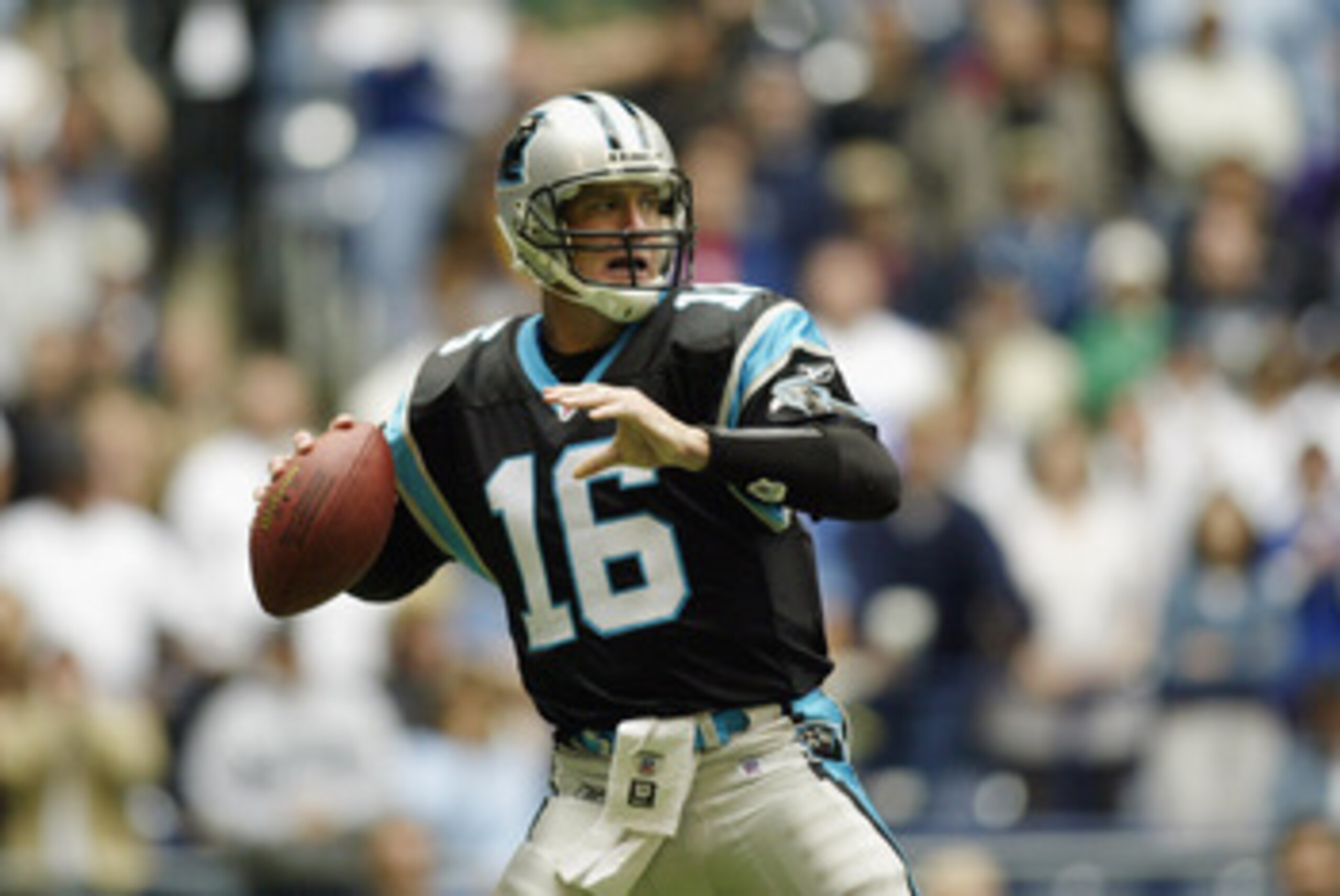 IRVING, TEXAS - OCTOBER 13:  Quarterback Chris Weinke #16 of the Carolina Panthers throws a pass during the NFL game against the Dallas Cowboys at Texas Stadium on October 13, 2002 in Irving, Texas.   The Cowboys defeated the Panthers 14-13.  (Photo by Ro