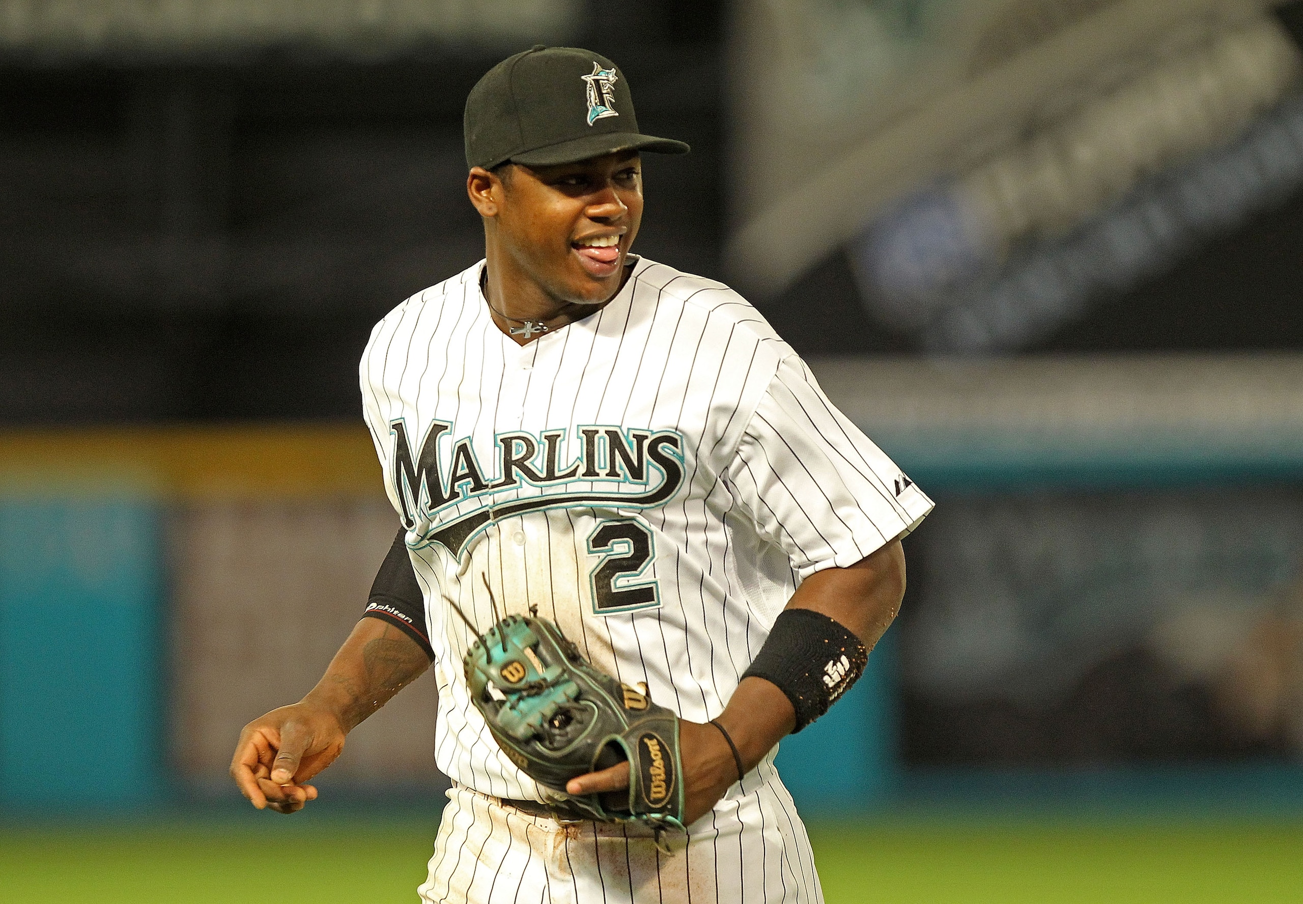 MIAMI GARDENS, FL - APRIL 21:  Hanley Ramirez #2 of the Florida Marlins laughs as he jogs off the field during a game against the Pittsburgh Pirates at Sun Life Stadium on April 21, 2011 in Miami Gardens, Florida.  (Photo by Mike Ehrmann/Getty Images)