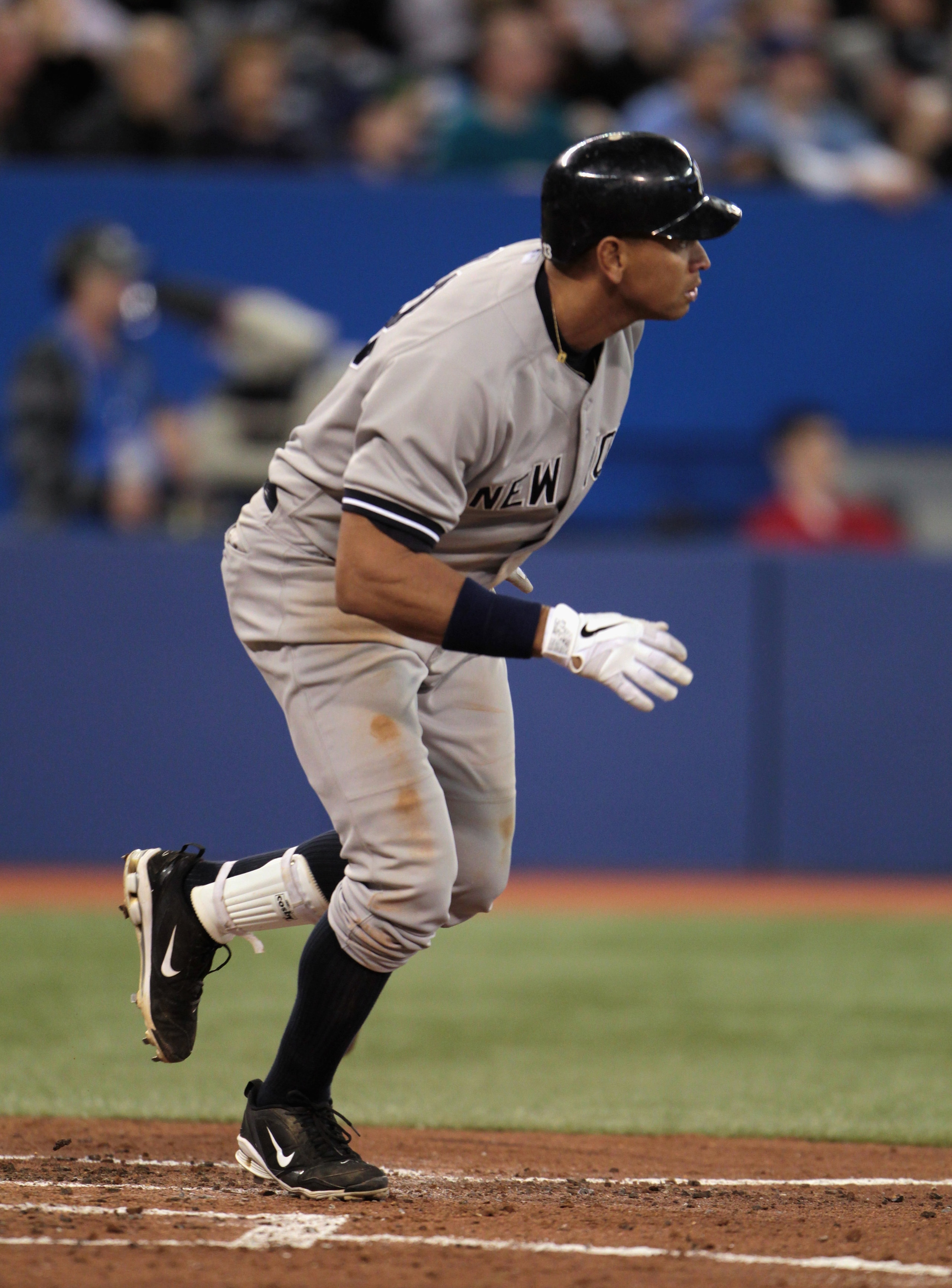 TORONTO, ON - APRIL 20:  Alex Rodriguez #13 of the New York Yankees watches his sacrifice fly ball during their game against the Toronto Blue Jays at Rogers Centre on April 20, 2011 in Toronto, Canada.  (Photo by Scott Halleran/Getty Images)