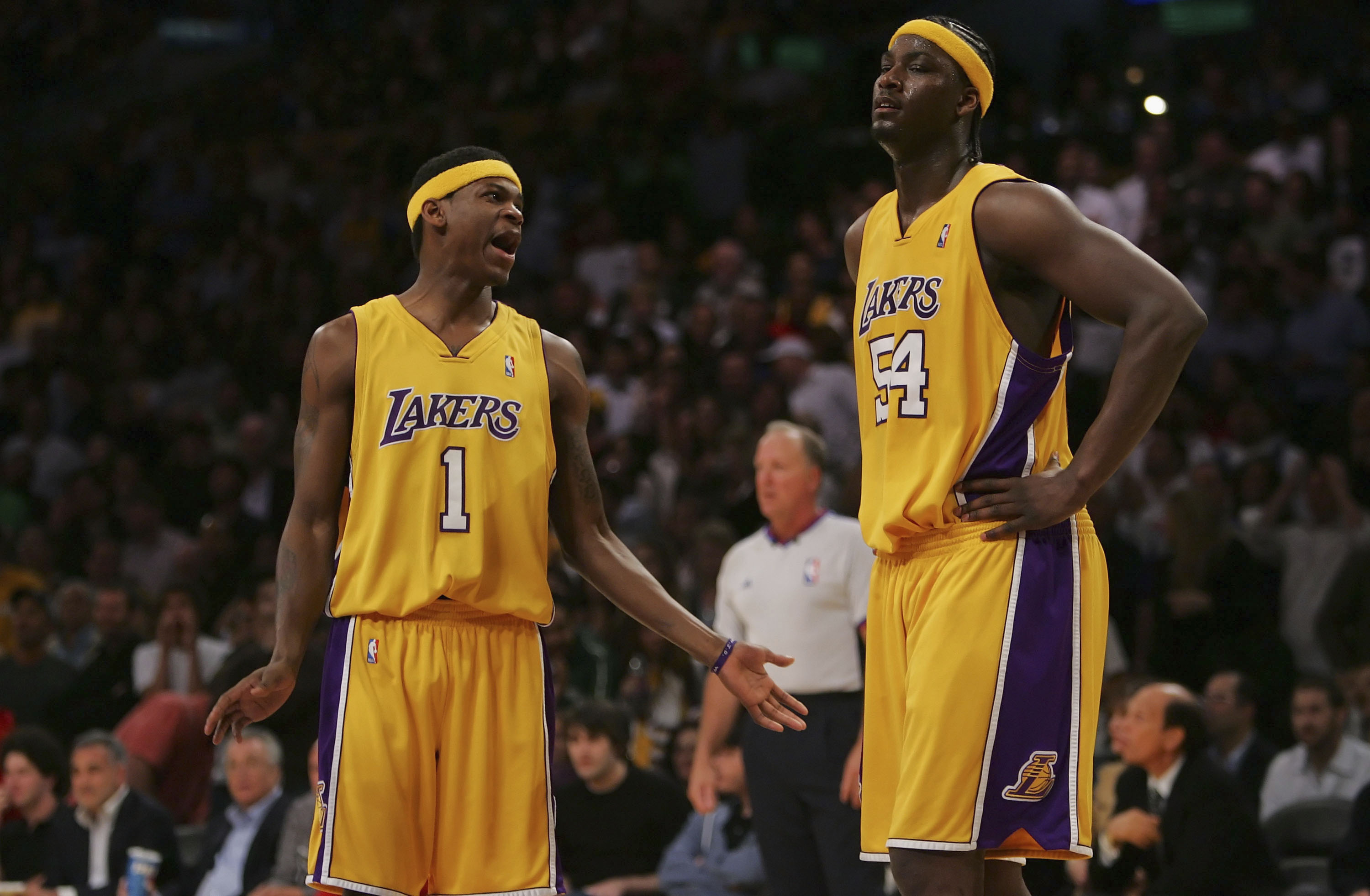 LOS ANGELES, CA - MARCH 30:  (L-R) Smush Parker #1 of the Los Angeles Lakers talks with his teammate Kwame Brown #54 during the game against the Houston Rockets at Staples Center on March 30, 2007 in Los Angeles, California.  NOTE TO USER: User expressly