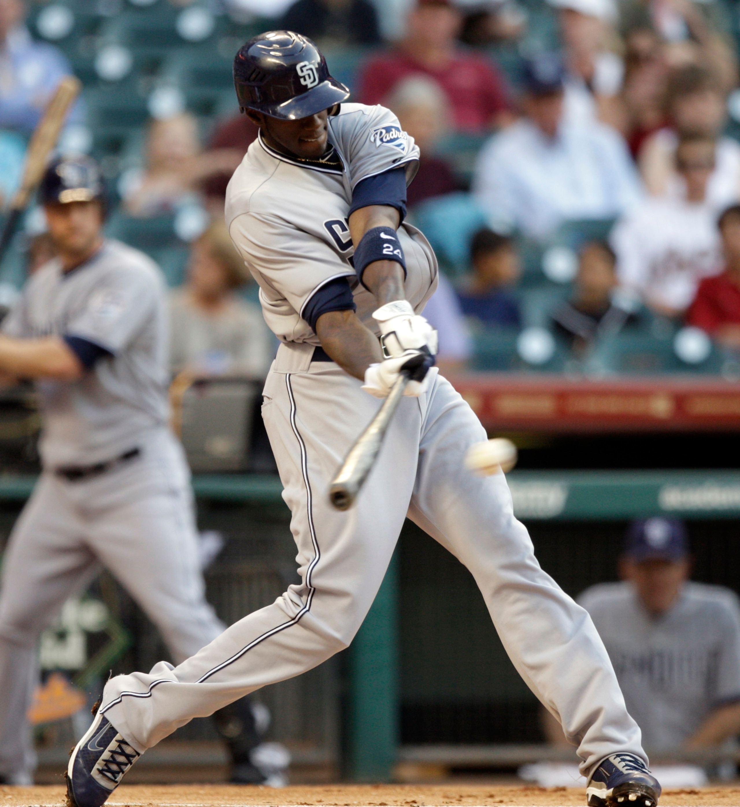 HOUSTON - APRIL 15:  Cameron Maybin #24 of the San Diego Padres singles in the first inning against the Houston Astros in the first inning at Minute Maid Park on April 15, 2011 in Houston, Texas.  (Photo by Bob Levey/Getty Images)