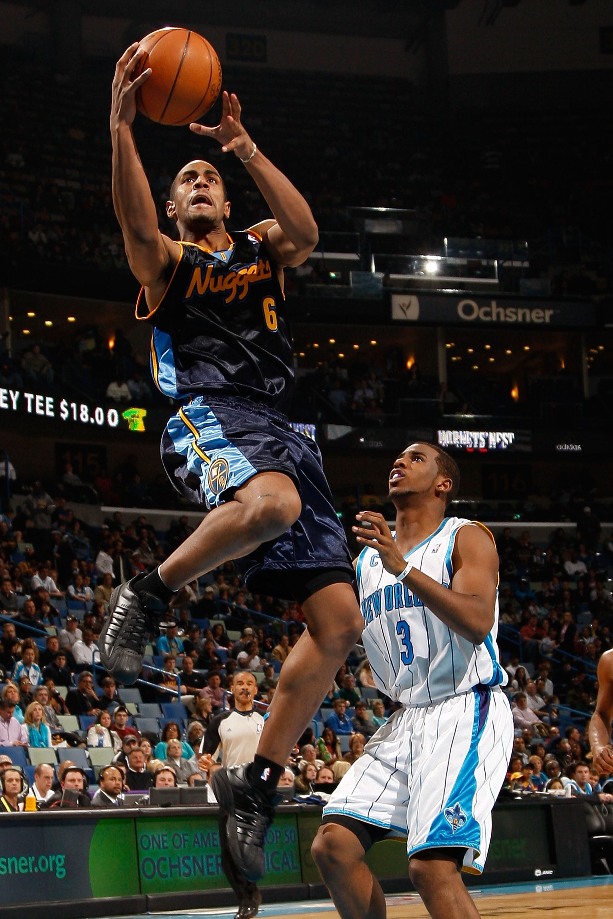 NEW ORLEANS - DECEMBER 18:  Arron Affalo #6 of the Denver Nuggets makes a shot over Chris Paul #3 of the New Orleans Hornets at New Orleans Arena on December 18, 2009 in New Orleans, Louisiana.  The Hornets defeated the Nuggets 98-92.   NOTE TO USER: User