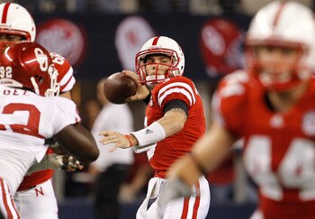 ARLINGTON, TX - DECEMBER 04:  Quarterback Taylor Martinez #3 of the Nebraska Cornhuskers looks for an open receiver against the Oklahoma Sooners at Cowboys Stadium on December 4, 2010 in Arlington, Texas.  (Photo by Tom Pennington/Getty Images)