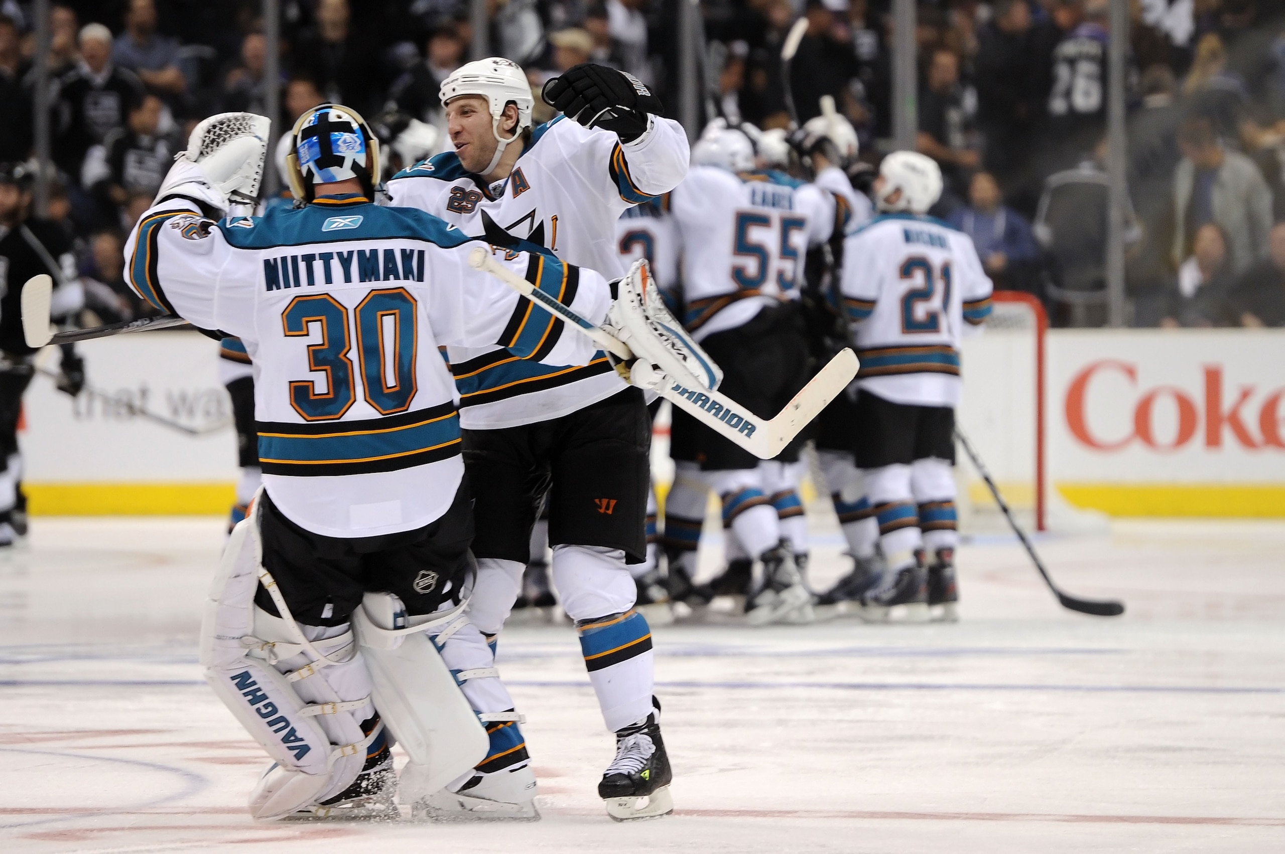 LOS ANGELES, CA - APRIL 19:  Antero Niittymaki #30 and Ryane Clowe #29 of the San Jose Sharks celebrate their 6-5 win over the Los Angeles Kings in overtime of game three of the Western Conference Quarterfinals during the 2011 NHL Stanley Cup Playoffs at