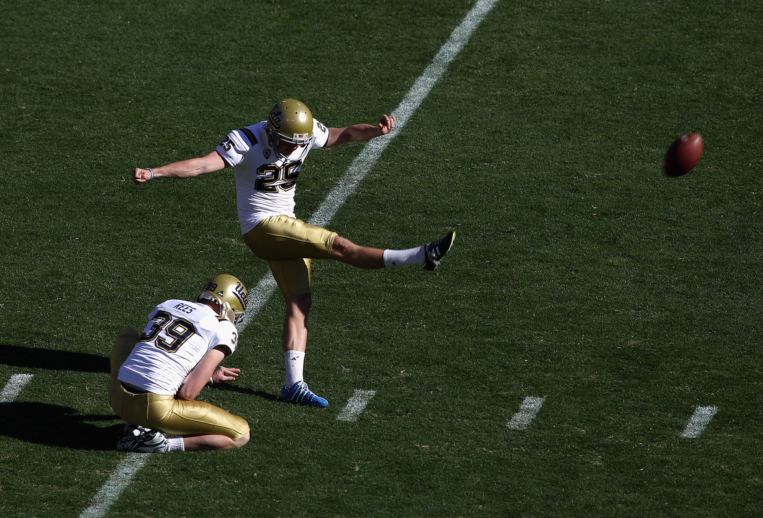 TEMPE, AZ - NOVEMBER 26: Kicker Kai Forbath #25 of the UCLA Bruins kicks the football during the college football game against the Arizona State Sun Devils at Sun Devil Stadium on November 26, 2010 in Tempe, Arizona. . The Sun Devils defeated the Bruins TEMPE, AZ - NOVEMBER 26: Kicker Kai Forbath #25 of the UCLA Bruins kicks the football during the college football game against the Arizona State Sun Devils at Sun Devil Stadium on November 26, 2010 in Tempe, Arizona. . The Sun Devils defeated the Bruins