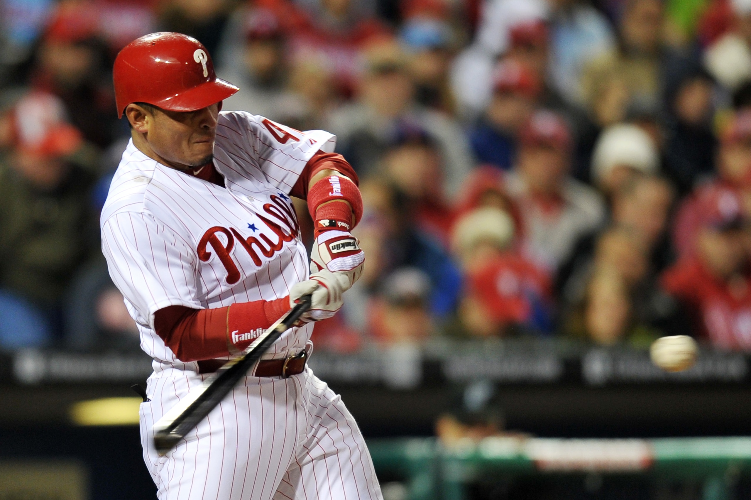 PHILADELPHIA, PA - APRIL 15: Carlos Ruiz #51 of the Philadelphia Phillies hits a double during the game against the Florida Marlins at Citizens Bank Park on April 15, 2011 in Philadelphia, Pennsylvania. (Photo by Drew Hallowell/Getty Images)