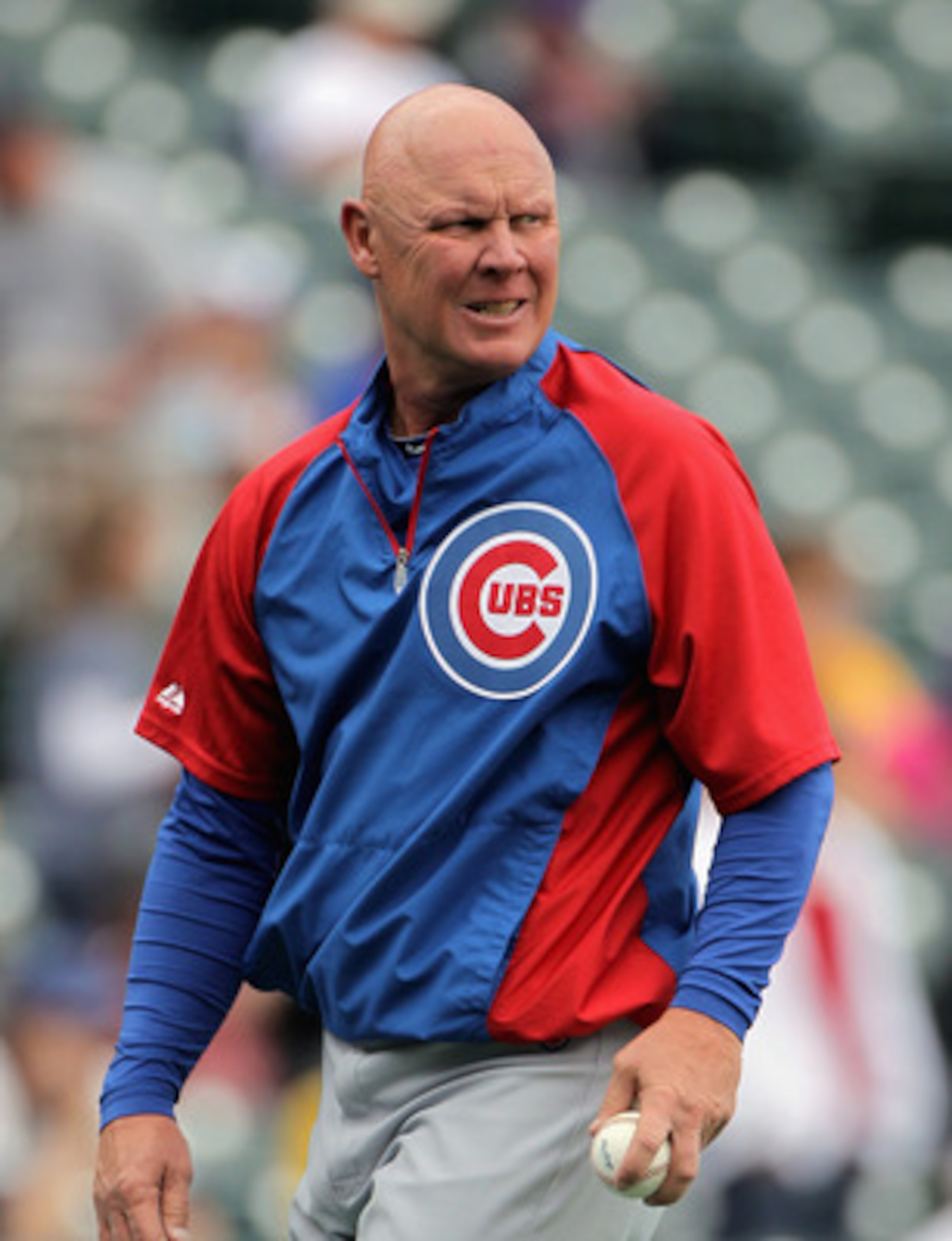 DENVER, CO - APRIL 17:  Manager Mike Quade #8 of the Chicago Cubs pitches batting practice prior to facing the Colorado Rockies at Coors Field on April 17, 2011 in Denver, Colorado.  (Photo by Doug Pensinger/Getty Images)