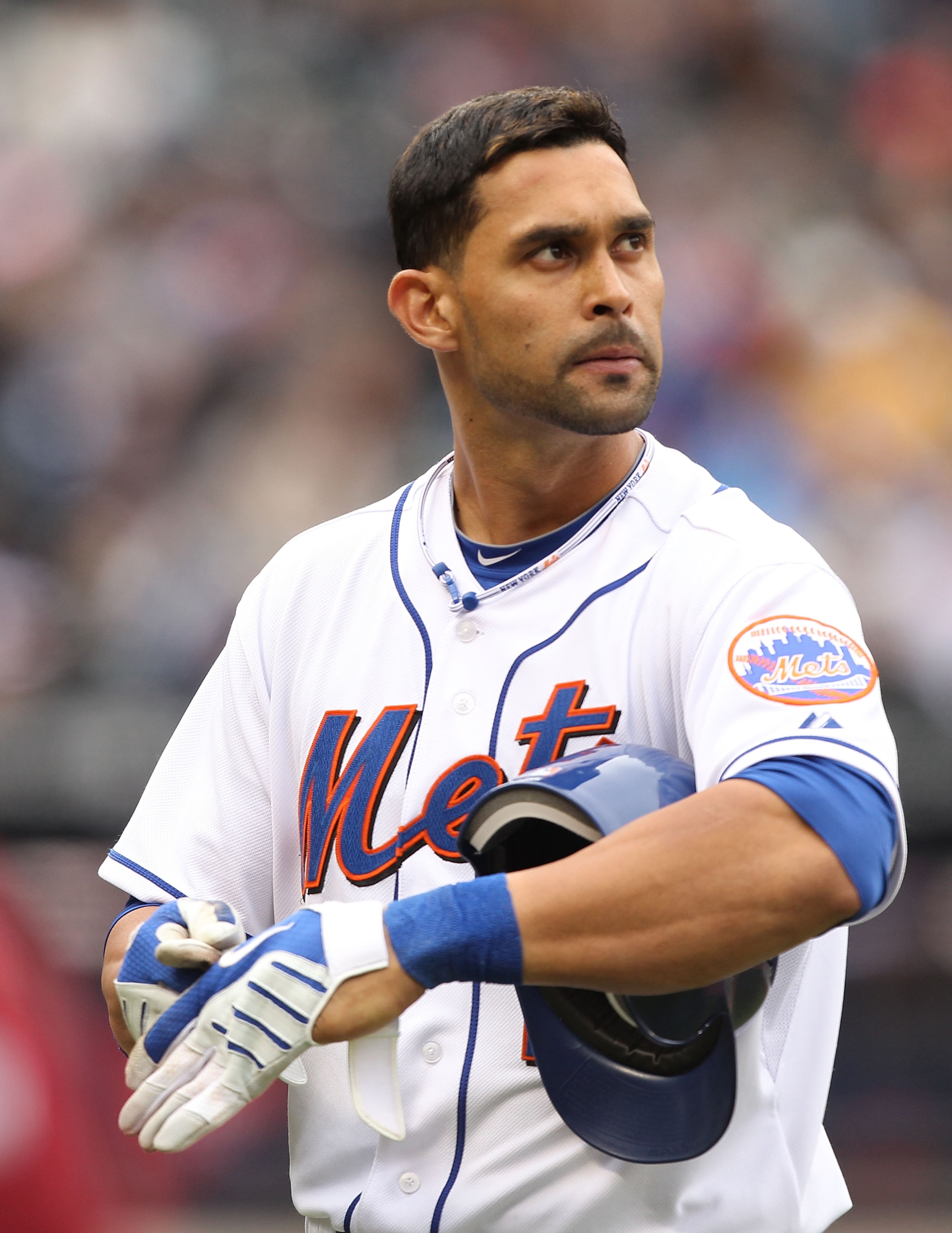 NEW YORK, NY - APRIL 10:  Angel Pagan #16 of the New York Mets reacts after striking out to end the Tenth inning with Jose Reyes on third base against the Washington Nationals during their game on April 10, 2011 at Citi Field in the Flushing neighborhood