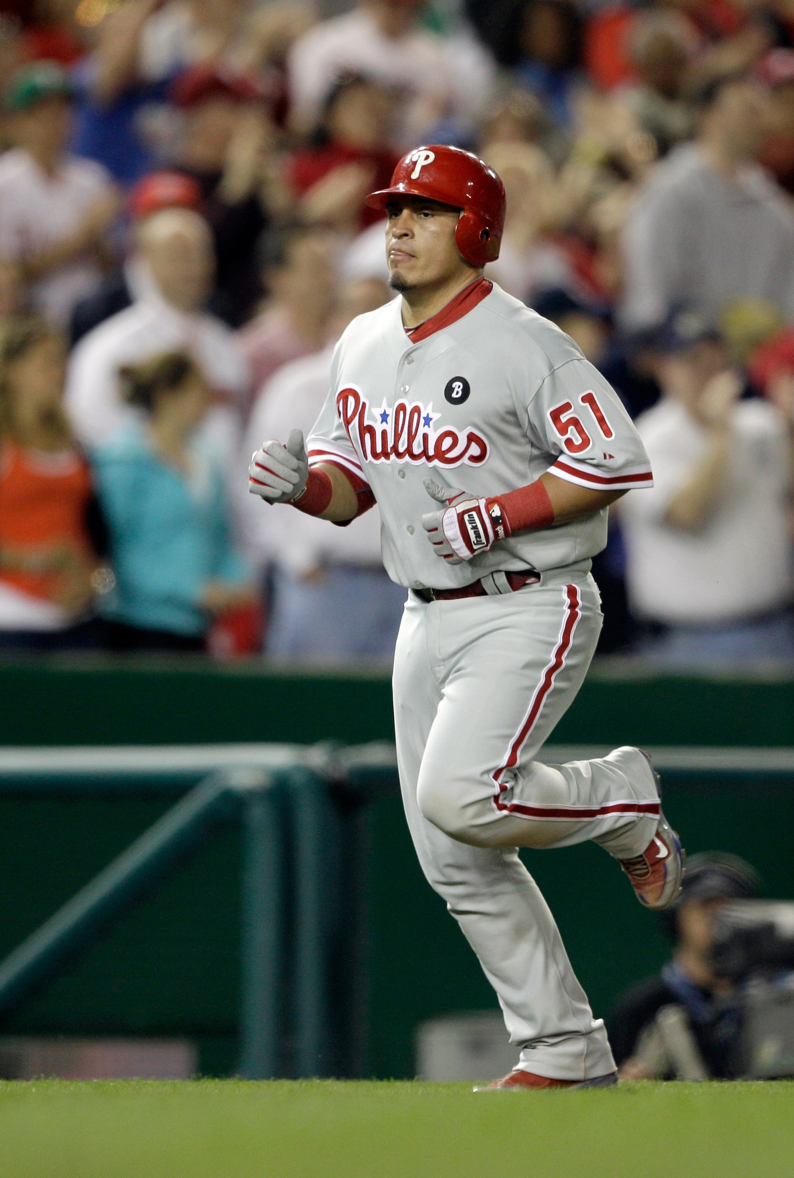 WASHINGTON, DC - APRIL 14: Carlos Ruiz #51 of the Philadelphia Phillies rounds the bases after hitting a home run against the Washington Nationals at Nationals Park on April 14, 2011 in Washington, DC.  (Photo by Rob Carr/Getty Images)