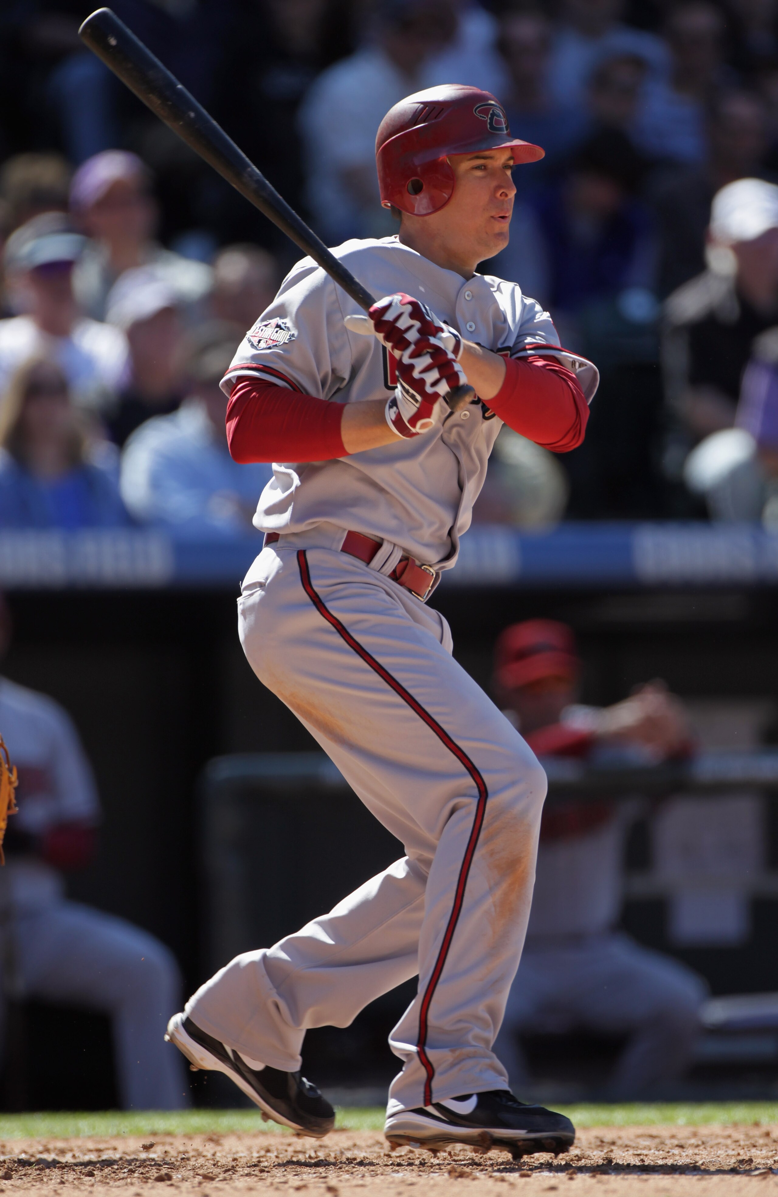 DENVER, CO - APRIL 01:  Kelly Johnson #2 of the Arizona Diamondbacks takes an at bat against the Colorado Rockies during Opening Day at Coors Field on April 1, 2011 in Denver, Colorado. The Diamondbacks defeated the Rockies 7-6 in 11 innings.  (Photo by D