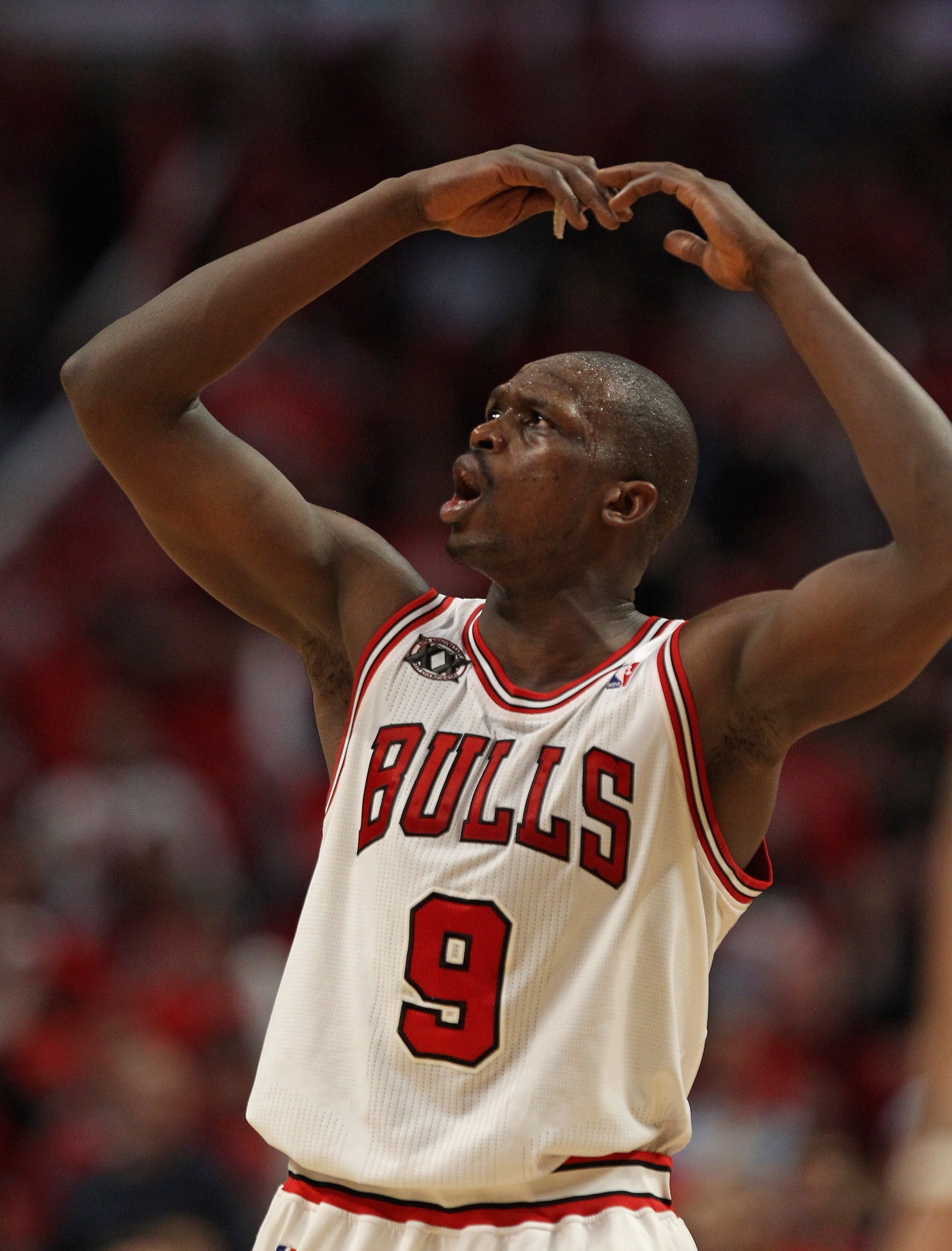 CHICAGO, IL - APRIL 16: Loul Deng #9 of the Chicago Bulls encourages the crowd to cheer in the 4th quarter against the Indiana Pacers in Game One of the Eastern Conference Quarterfinals in the 2011 NBA Playoffs at the United Center on April 16, 2011 in Ch CHICAGO, IL - APRIL 16: Loul Deng #9 of the Chicago Bulls encourages the crowd to cheer in the 4th quarter against the Indiana Pacers in Game One of the Eastern Conference Quarterfinals in the 2011 NBA Playoffs at the United Center on April 16, 2011 in Ch