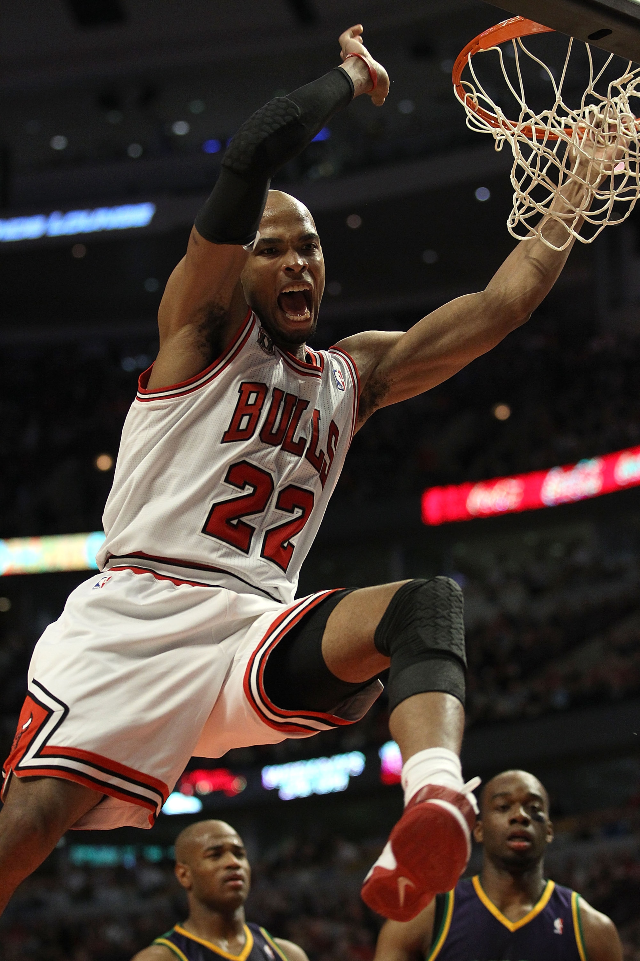 CHICAGO, IL - MARCH 07: Taj Gibson #22 of the Chicago Bulls celebrates a dunk against the New Orleans Hornets at the United Center on March 7, 2011 in Chicago, Illinois. The Bulls defeated the Hornets 85-77. NOTE TO USER: User expressly acknowledges and a CHICAGO, IL - MARCH 07: Taj Gibson #22 of the Chicago Bulls celebrates a dunk against the New Orleans Hornets at the United Center on March 7, 2011 in Chicago, Illinois. The Bulls defeated the Hornets 85-77. NOTE TO USER: User expressly acknowledges and a