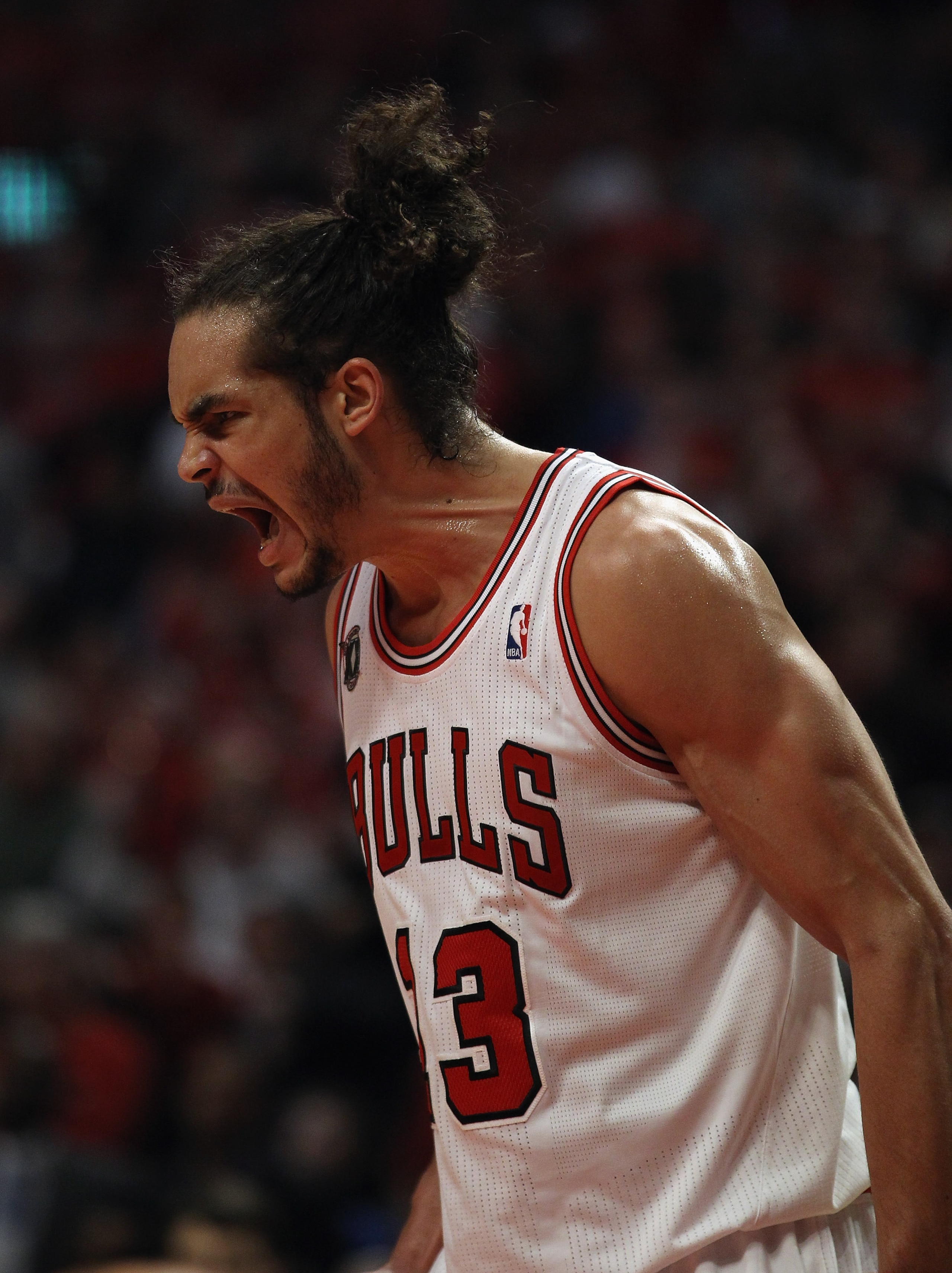 CHICAGO, IL - APRIL 16: Joakim Noah #13 of the Chicago Bulls celebrates a win over the Indiana Pacers in Game One of the Eastern Conference Quarterfinals in the 2011 NBA Playoffs at the United Center on April 16, 2011 in Chicago, Illinois. The Bulls defea CHICAGO, IL - APRIL 16: Joakim Noah #13 of the Chicago Bulls celebrates a win over the Indiana Pacers in Game One of the Eastern Conference Quarterfinals in the 2011 NBA Playoffs at the United Center on April 16, 2011 in Chicago, Illinois. The Bulls defea