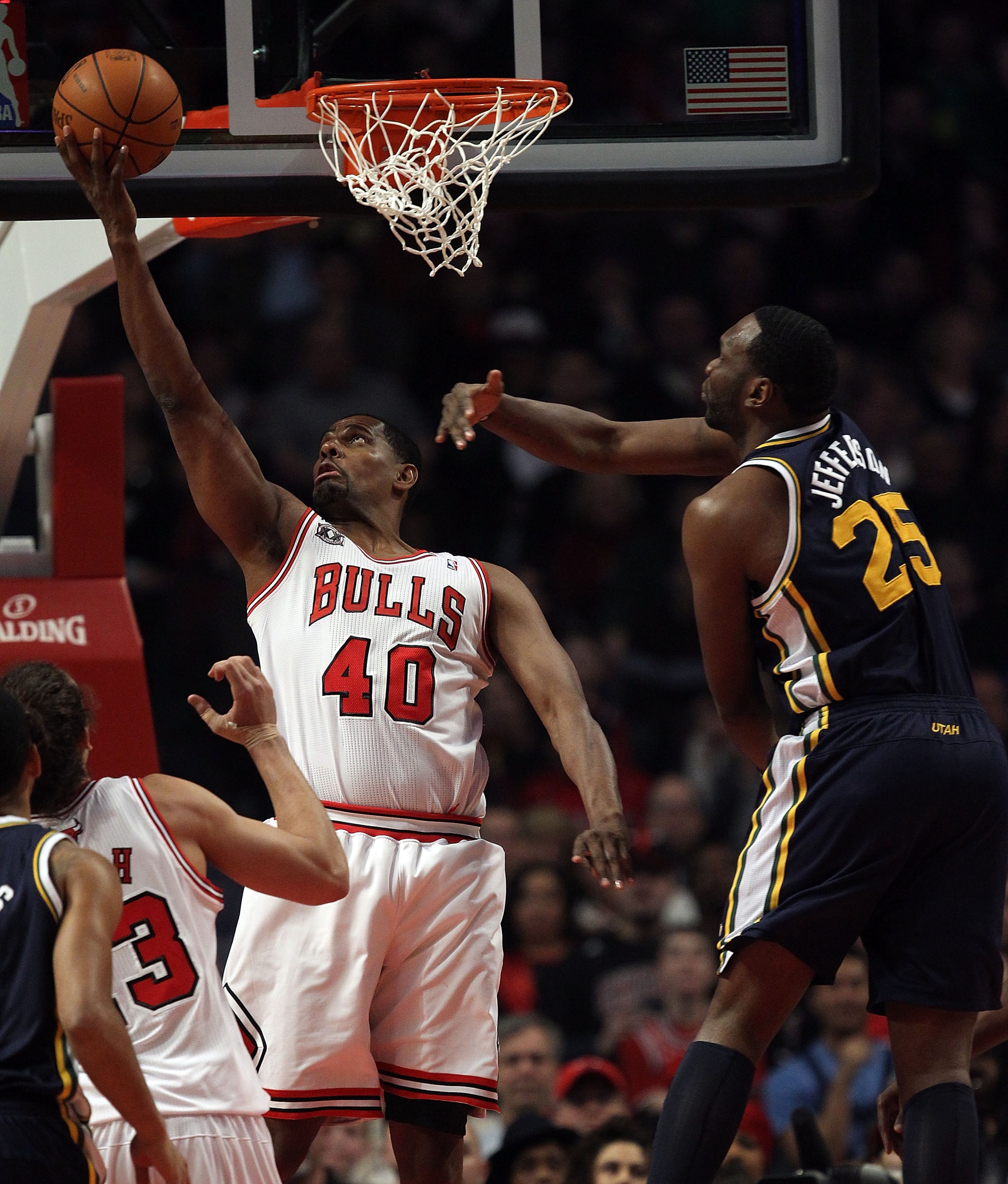 CHICAGO, IL - MARCH 12: Kurt Thomas #40 of the Chicago Bulls puts up a shot under pressure from Al Jefferson #25 of the Utah Jazz at the United Center on March 12, 2011 in Chicago, Illinois. NOTE TO USER: User expressly acknowledges and agrees that, by do CHICAGO, IL - MARCH 12: Kurt Thomas #40 of the Chicago Bulls puts up a shot under pressure from Al Jefferson #25 of the Utah Jazz at the United Center on March 12, 2011 in Chicago, Illinois. NOTE TO USER: User expressly acknowledges and agrees that, by do