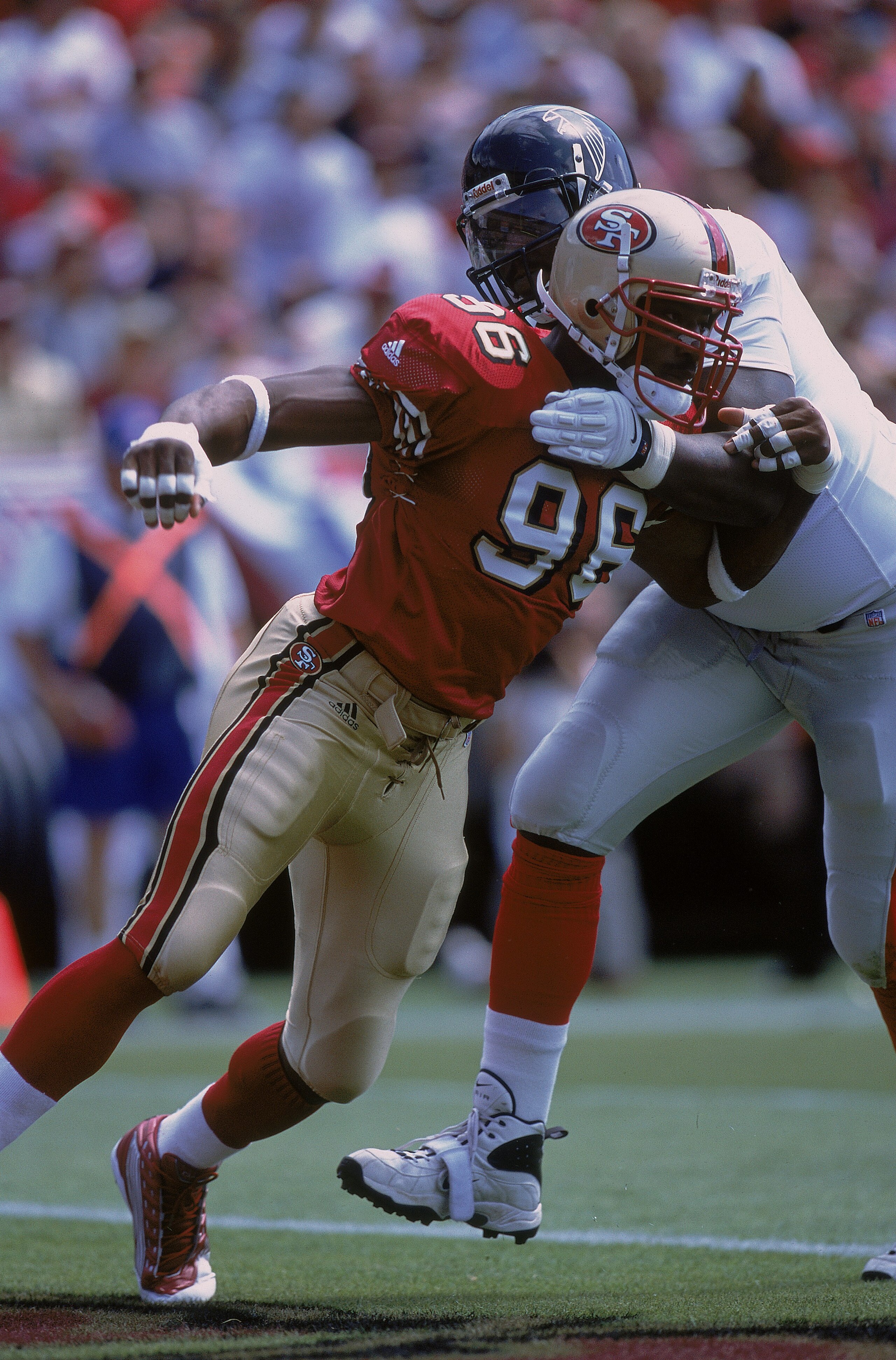 9 Sep 2001:  Andre Carter #96 of the San Francisco 49ers blocking Bob Whitfield #70 during the game against the Atlanta Falcons at 3Com Park in San Francisco, Claifornia.  The 49ers defeated the Falcons 16-13.Mandatory Credit: Tom Hauck  /Allsport