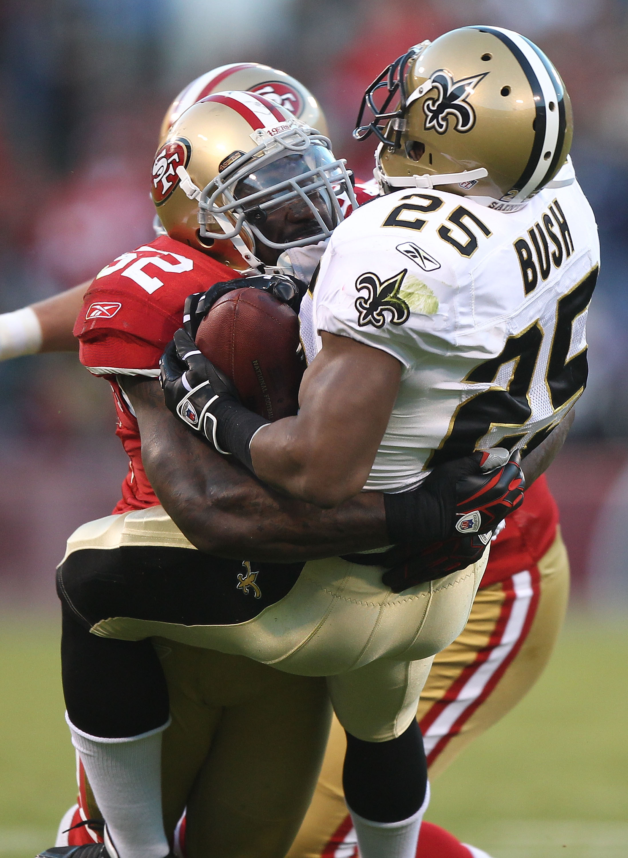 SAN FRANCISCO - SEPTEMBER 20: Patrick Willis #52 of the San Francisco 49er tackles Reggie Bush #25 of the New Orleans Saints during an NFL game at Candlestick Park on September 20, 2010 in San Francisco, California.(Photo by Jed Jacobsohn/Getty Images) SAN FRANCISCO - SEPTEMBER 20: Patrick Willis #52 of the San Francisco 49er tackles Reggie Bush #25 of the New Orleans Saints during an NFL game at Candlestick Park on September 20, 2010 in San Francisco, California.(Photo by Jed Jacobsohn/Getty Images)