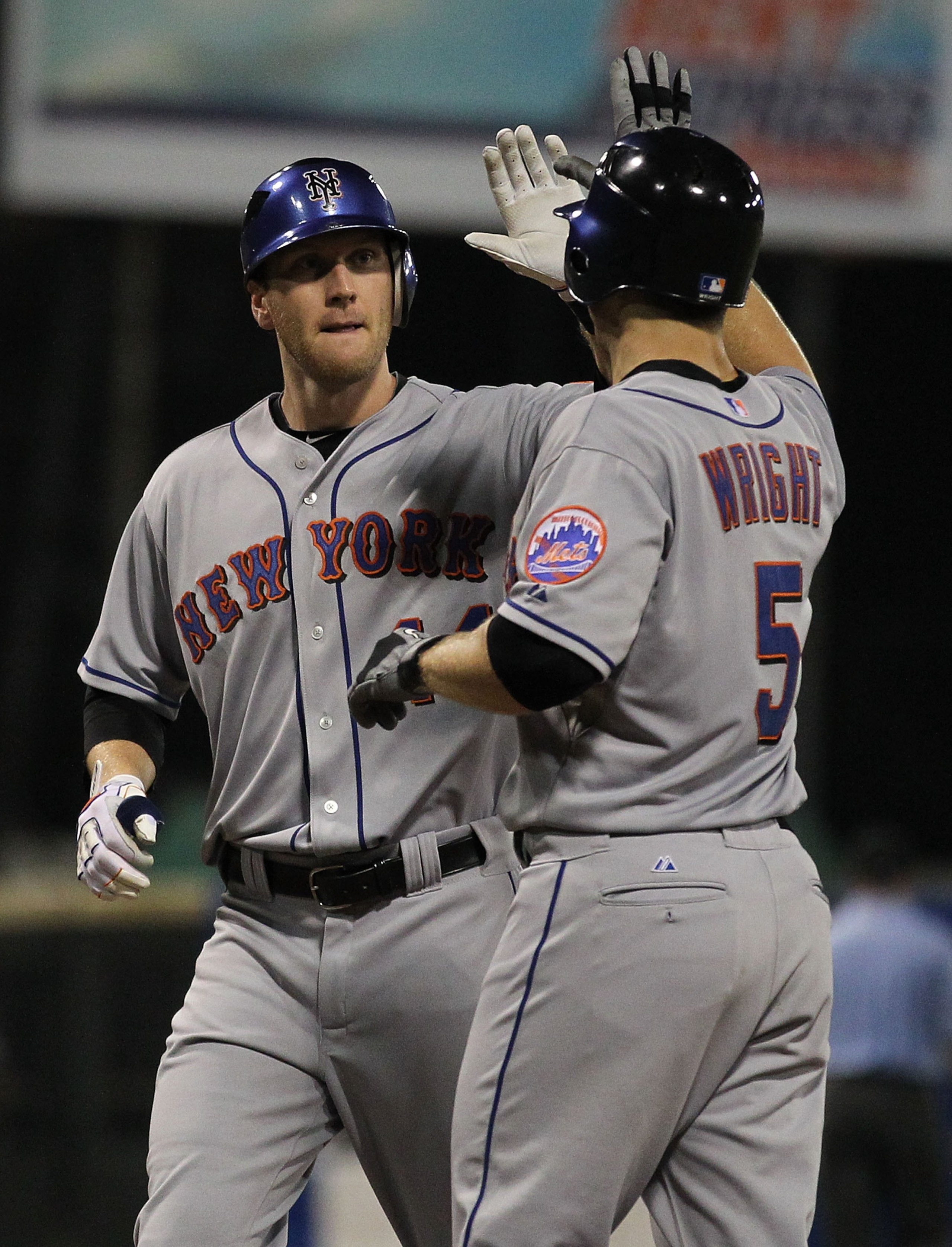SAN JUAN, PUERTO RICO - JUNE 28:  Jason Bay #44 of the New York Mets is greeted by David Wright #5 after hitting a home run against the Florida Marlins  during their game at Hiram Bithorn Stadium on June 28, 2010 in San Juan, Puerto Rico.  (Photo by Al Be