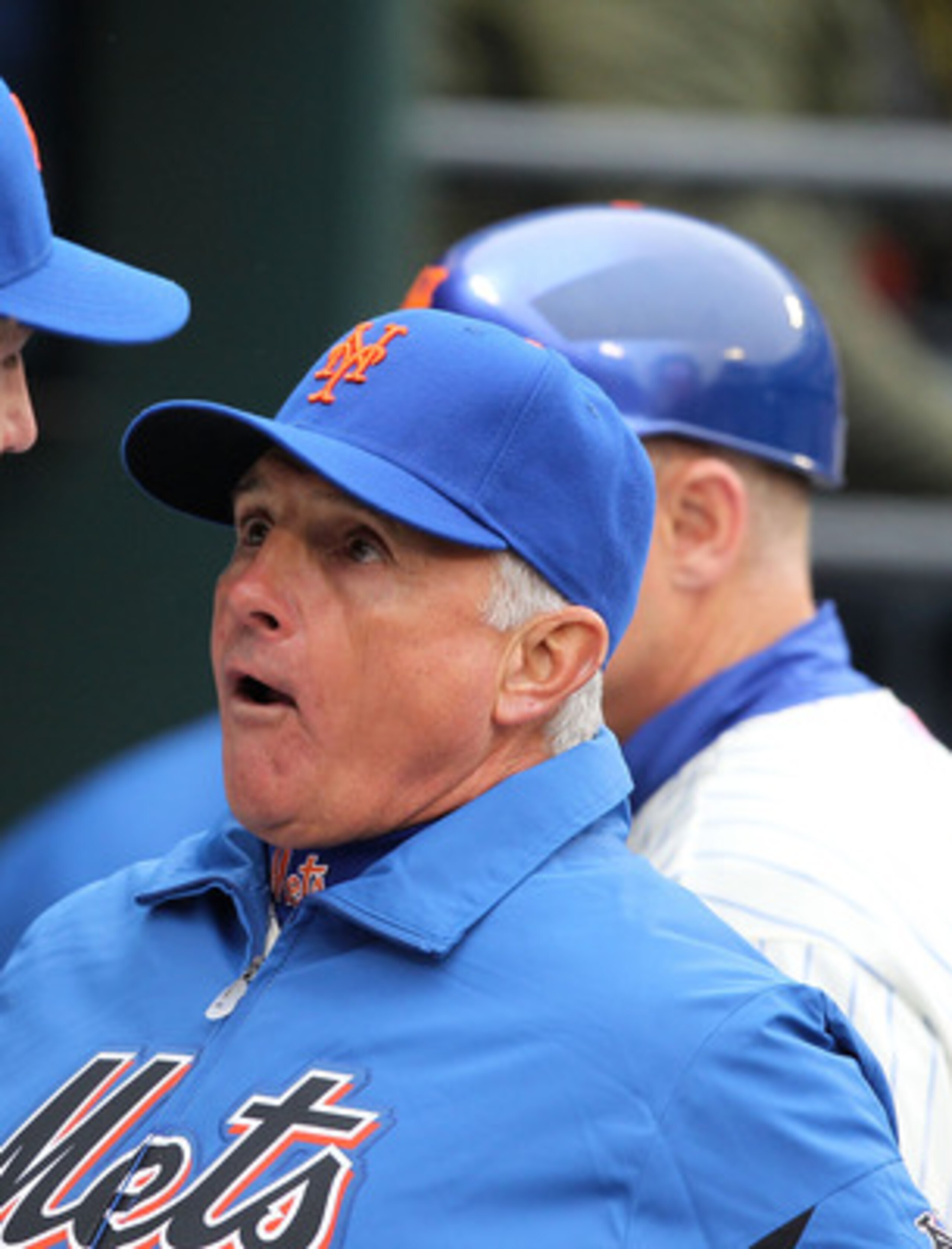 NEW YORK, NY - APRIL 08:  Manager Terry Collins (R) #10 of the New York Mets talks with pitcher R.A. Dickey in the dugout against the Washington Nationals during the Mets' Home Opener at Citi Field on April 8, 2011 in the Flushing neighborhood of Queens i