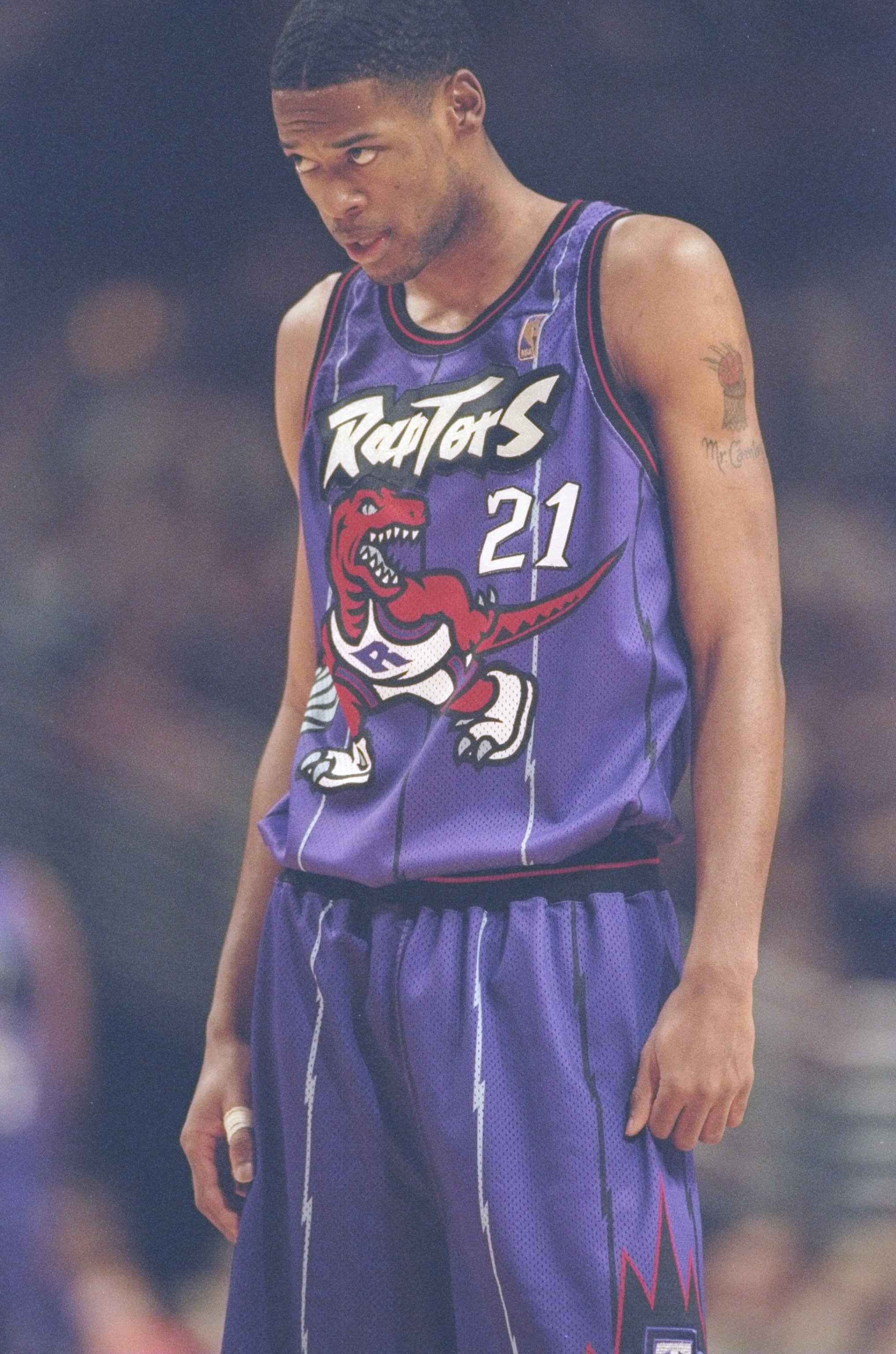 25 Jan 1997:  Center Marcus Camby of the Toronto Raptors stands on the court during a game against the Chicago Bulls at the United Center in Chicago, Illinois.  The Bulls won the game 110-98.  Mandatory Credit: Jonathan Daniel  /Allsport