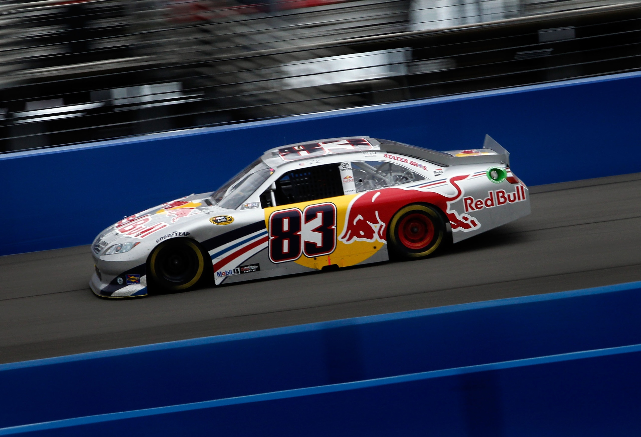 FONTANA, CA - MARCH 27:  Brian Vickers, driver of the #83 Red Bull Toyota, races during the NASCAR Sprint Cup Series Auto Club 400 at Auto Club Speedway on March 27, 2011 in Fontana, California.  (Photo by Tom Pennington/Getty Images)