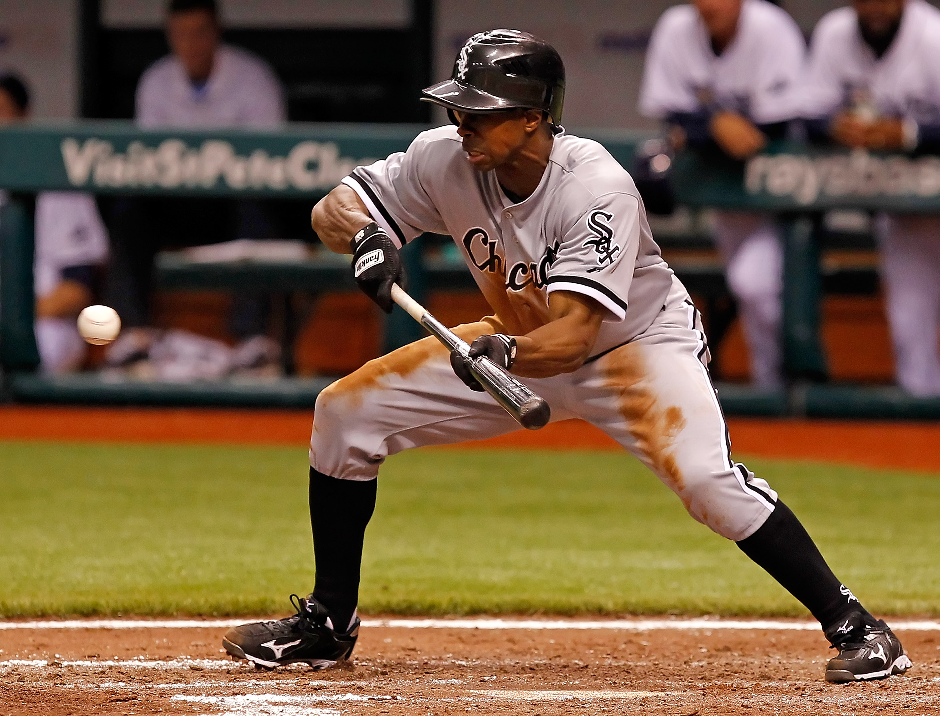 Marlins outfielder Juan Pierre bunting for a hit.