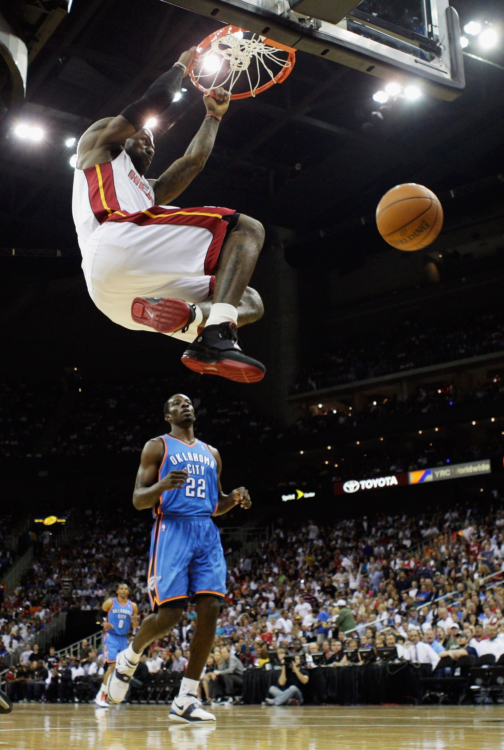 KANSAS CITY, MO - OCTOBER 08:  LeBron James #6 of the Miami Heat dunks over Jeff Green #22 of the Oklahoma City Thunder during the preseason game on October 8, 2010 at the Sprint Center in Kansas City, Missouri.  (Photo by Jamie Squire/Getty Images)