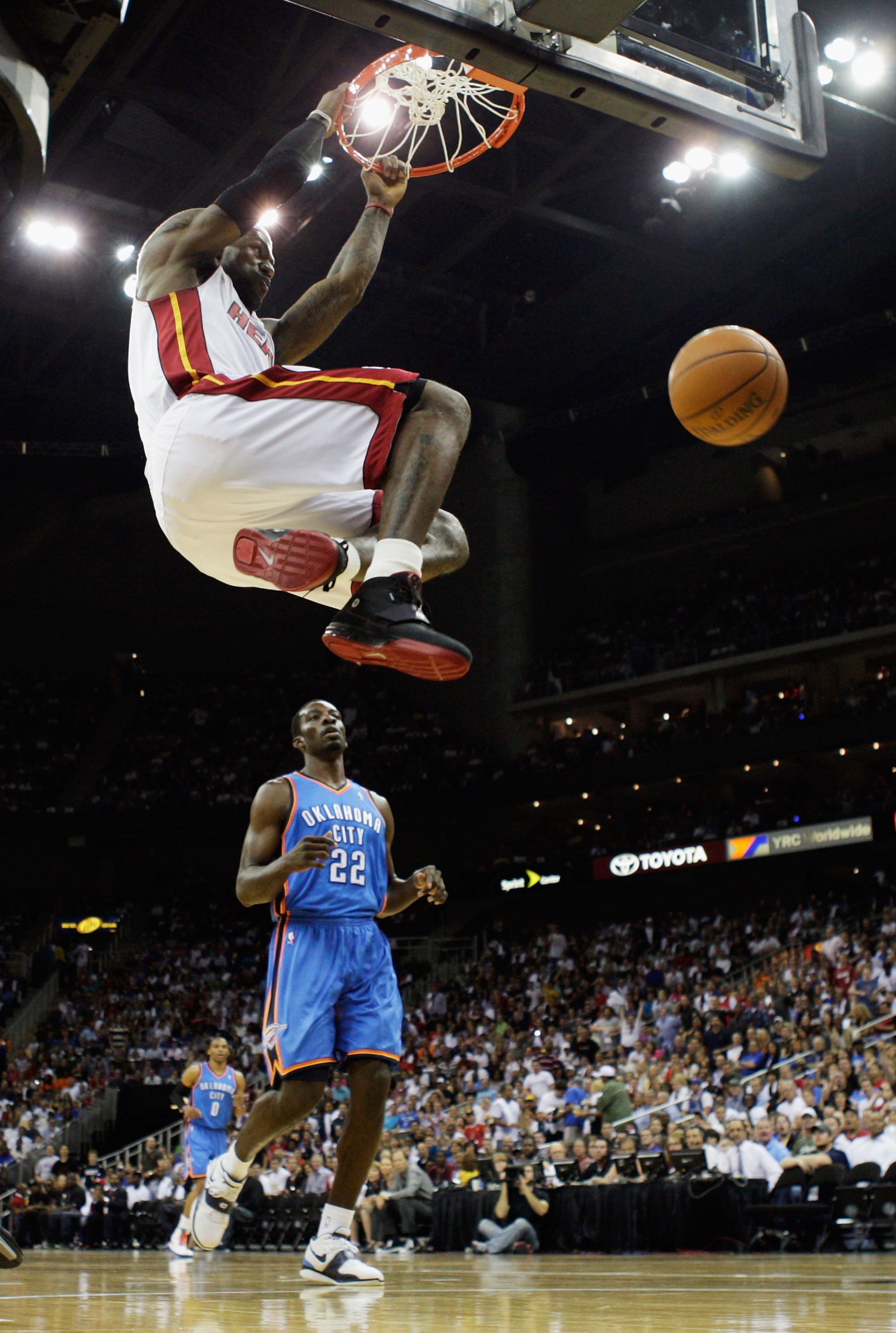 KANSAS CITY, MO - OCTOBER 08:  LeBron James #6 of the Miami Heat dunks over Jeff Green #22 of the Oklahoma City Thunder during the preseason game on October 8, 2010 at the Sprint Center in Kansas City, Missouri.  (Photo by Jamie Squire/Getty Images)