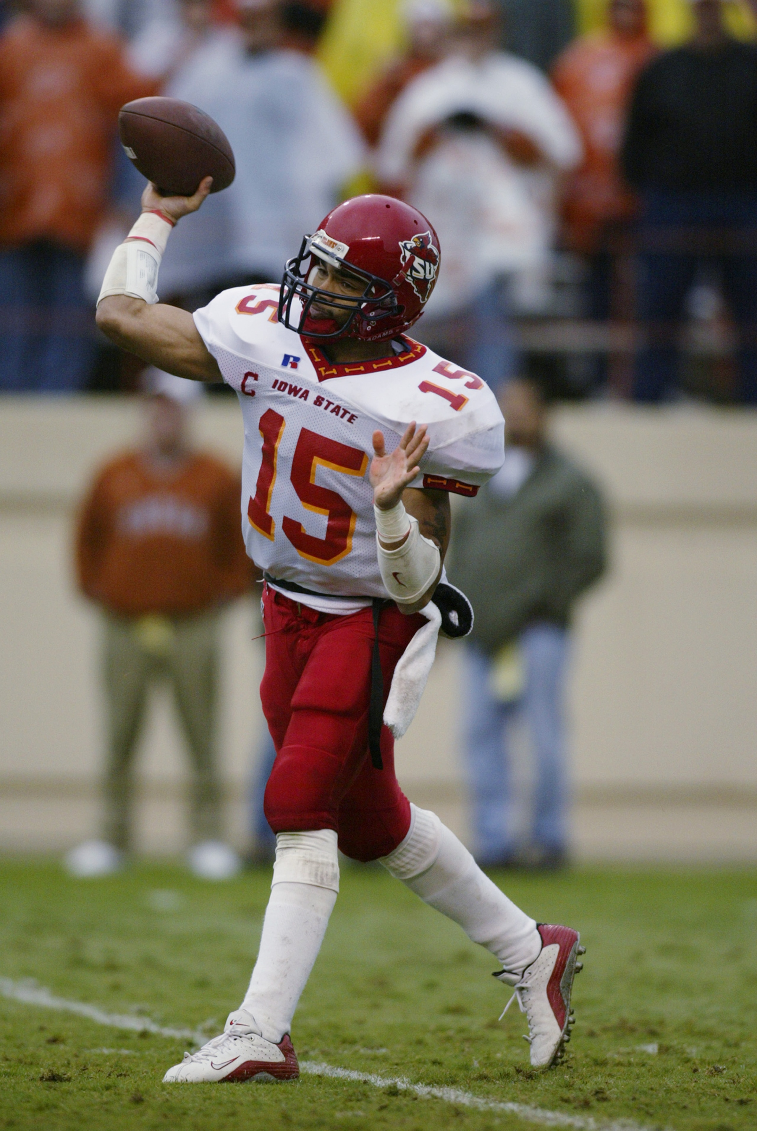 AUSTIN, TX - OCTOBER 26:  Quarterback Seneca Wallace #15 of the Iowa State Cyclones throws against the Texas Longhorns during the NCAA football game at Texas Memorial Stadium in Austin, Texas on October 26, 2002.  The Longhorns defeated the Cyclones 21-10