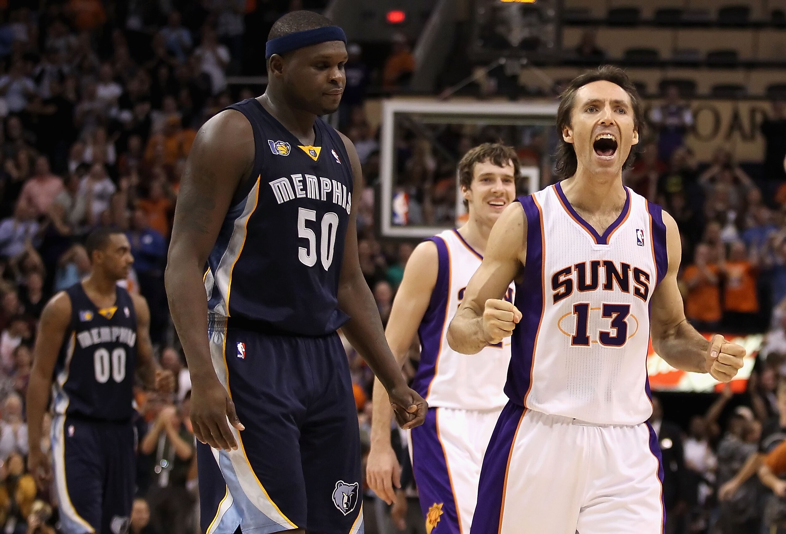 PHOENIX - DECEMBER 08:  Steve Nash #13 of the Phoenix Suns reacts after Hedo Turkoglu #19 hit a go ahead three point shot in the final moments of the NBA game against the Memphis Grizzlies at US Airways Center on December 8, 2010 in Phoenix, Arizona. The