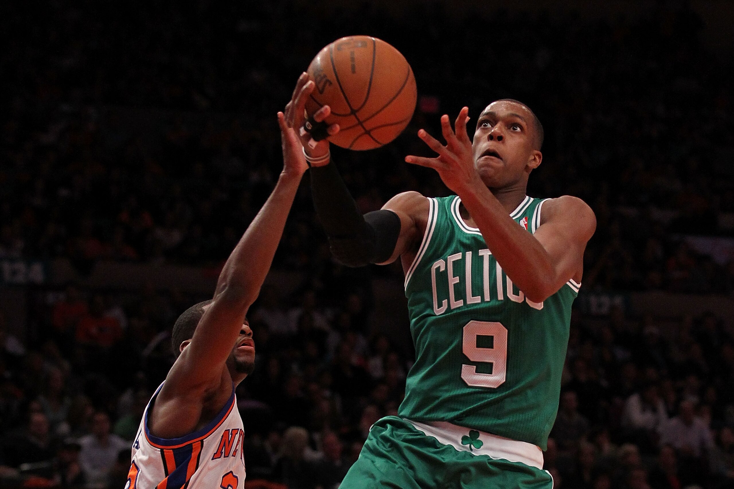NEW YORK, NY - APRIL 22:  Rajon Rondo #9 of the Boston Celtics drives for a shot attempt against Toney Douglas #23 of the New York Knicks in Game Three of the Eastern Conference Quarterfinals in the 2011 NBA Playoffs on April 22, 2011 at Madison Square Ga