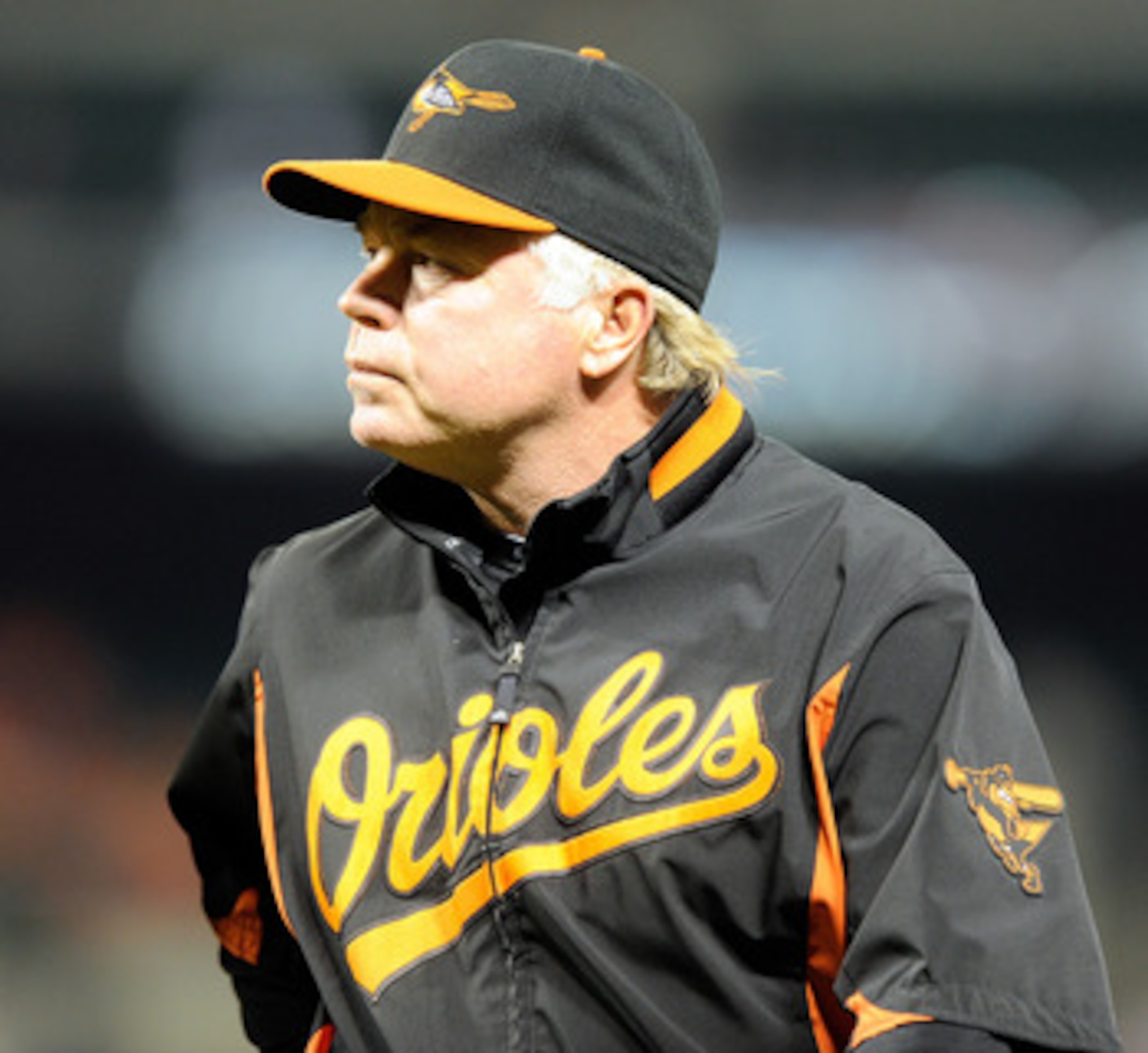 BALTIMORE, MD - APRIL 18:  Manager Buck Showalter of the Baltimore Orioles walks to the dugout during the game against the Minnesota Twins at Oriole Park at Camden Yards on April 18, 2011 in Baltimore, Maryland.  (Photo by Greg Fiume/Getty Images)