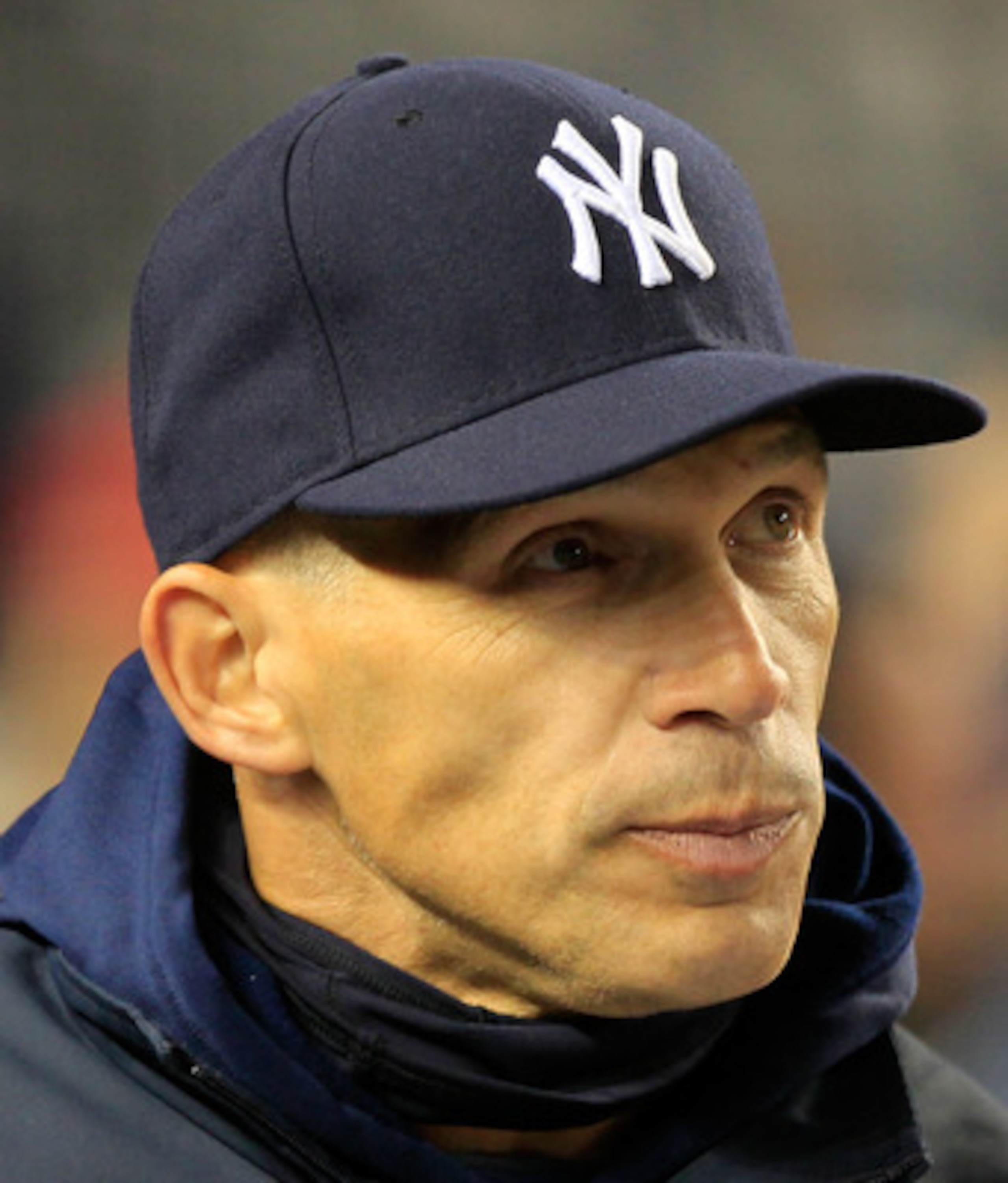 NEW YORK, NY - APRIL 15: Manager Joe Girardi of the New York Yankees looks on from the dugout during the game against the Texas Rangers at Yankee Stadium on April 15, 2011 in the Bronx borough of New York City.  (Photo by Chris Trotman/Getty Images)