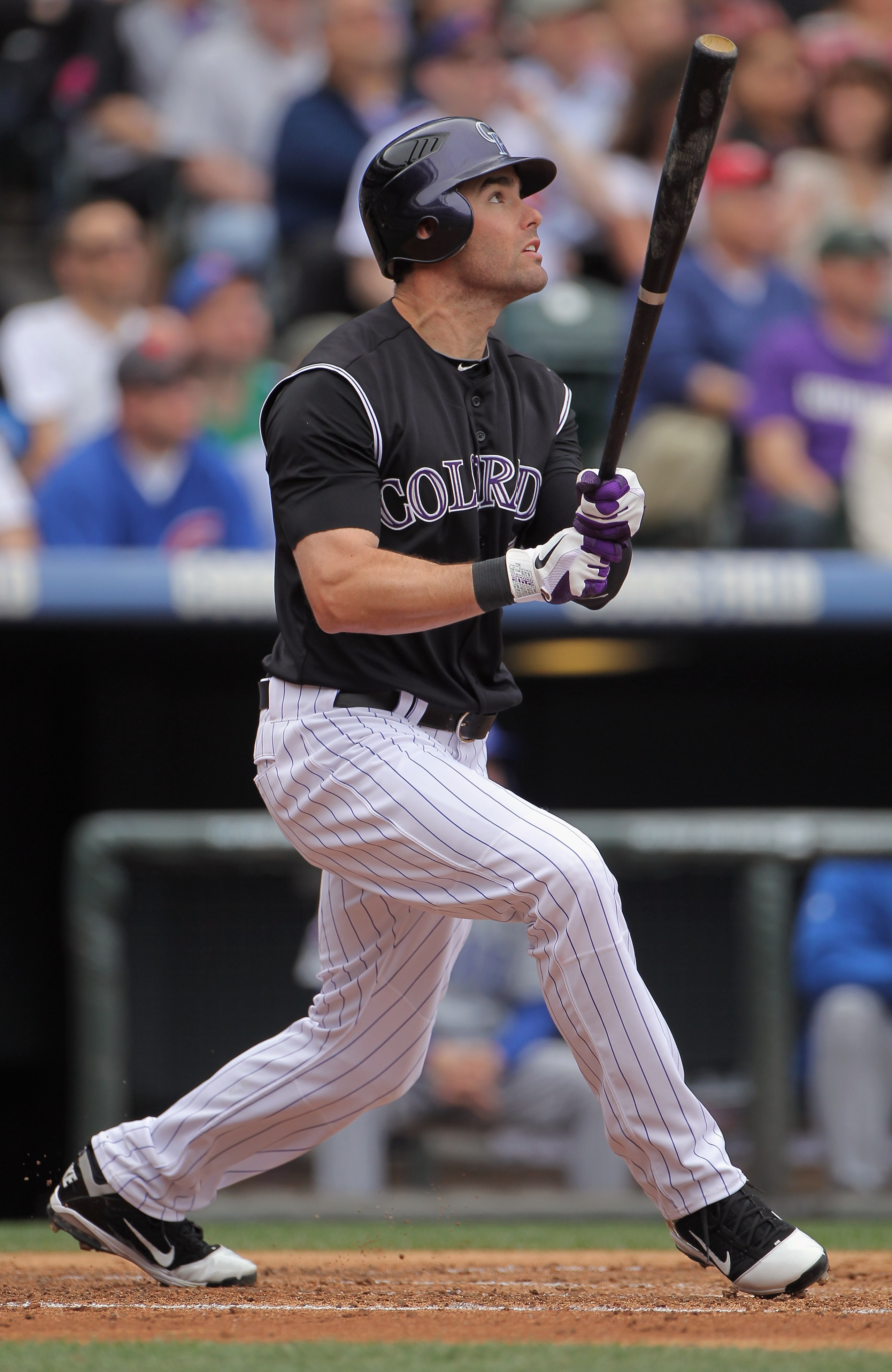 DENVER, CO - APRIL 17:  Seth Smith #7 of the Colorado Rockies watches his two run homerun off of starting pitcher Ryan Dempster #46 of the Chicago Cubs in the first inning at Coors Field on April 17, 2011 in Denver, Colorado.  (Photo by Doug Pensinger/Get