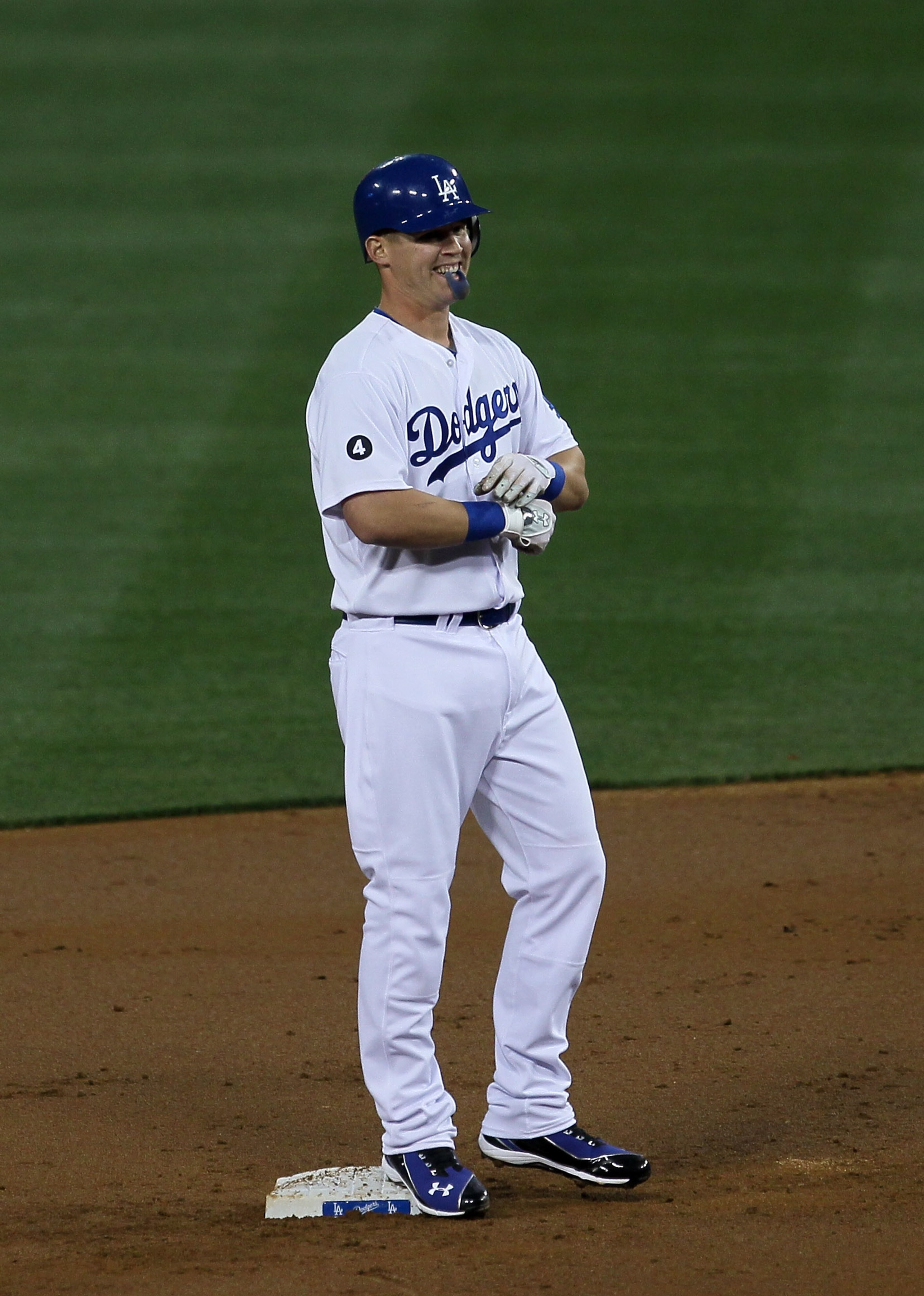 LOS ANGELES, CA - APRIL 18: Jerry Sands #47 of the Los Angeles Dodgers stands on second base after hitting a double in his first Major League at bat in the second inning against the Atlanta Braves on April 18, 2011 at Dodger Stadium in Los Angeles, Calif LOS ANGELES, CA - APRIL 18: Jerry Sands #47 of the Los Angeles Dodgers stands on second base after hitting a double in his first Major League at bat in the second inning against the Atlanta Braves on April 18, 2011 at Dodger Stadium in Los Angeles, Calif