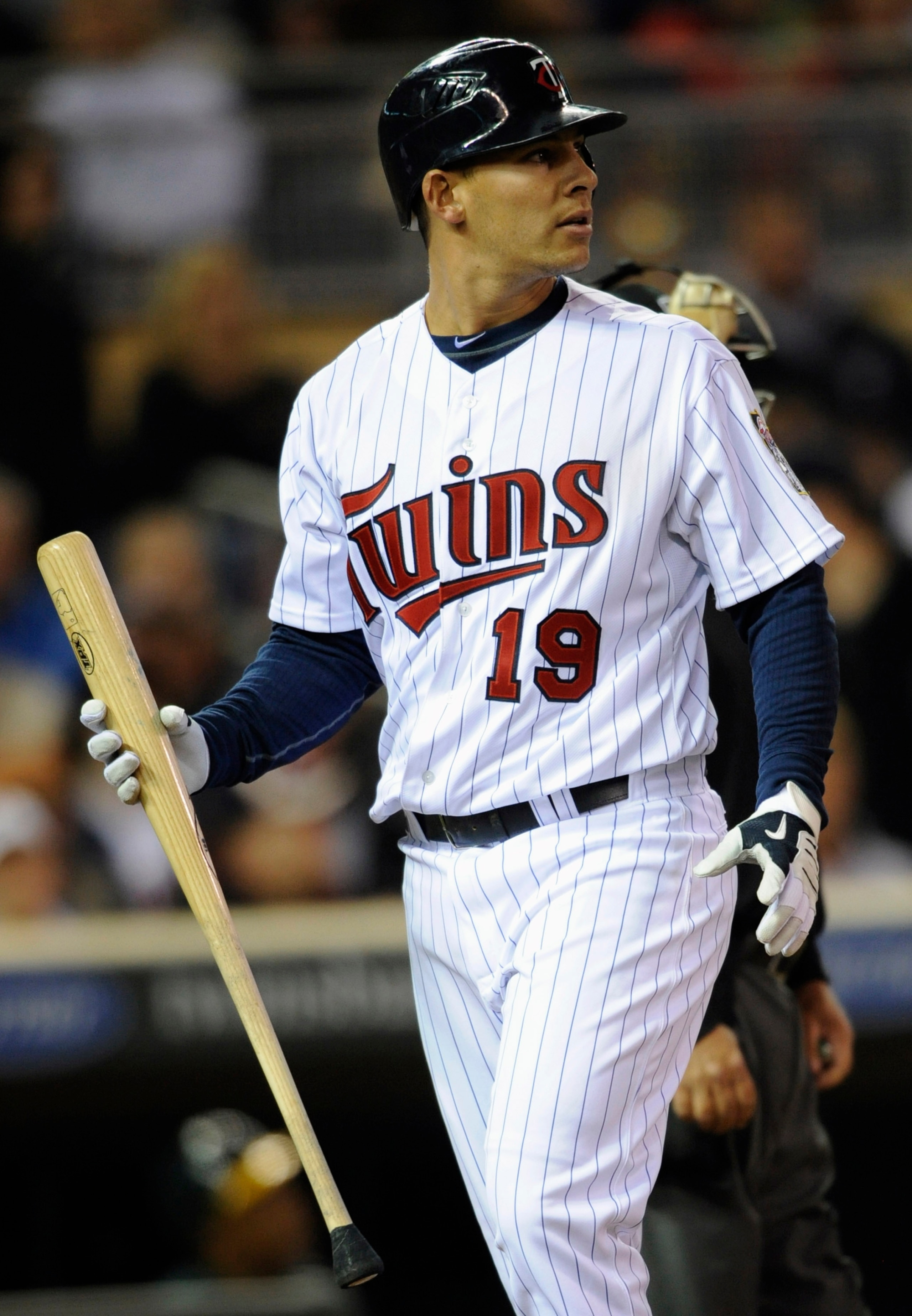 MINNEAPOLIS, MN - APRIL 9: Danny Valencia #19 of the Minnesota Twins reacts to a strikeout against the Oakland Athletics during the seventh inning of their game on April 9, 2011 at Target Field in Minneapolis, Minnesota. Athletics defeated the Twins 1-0. 