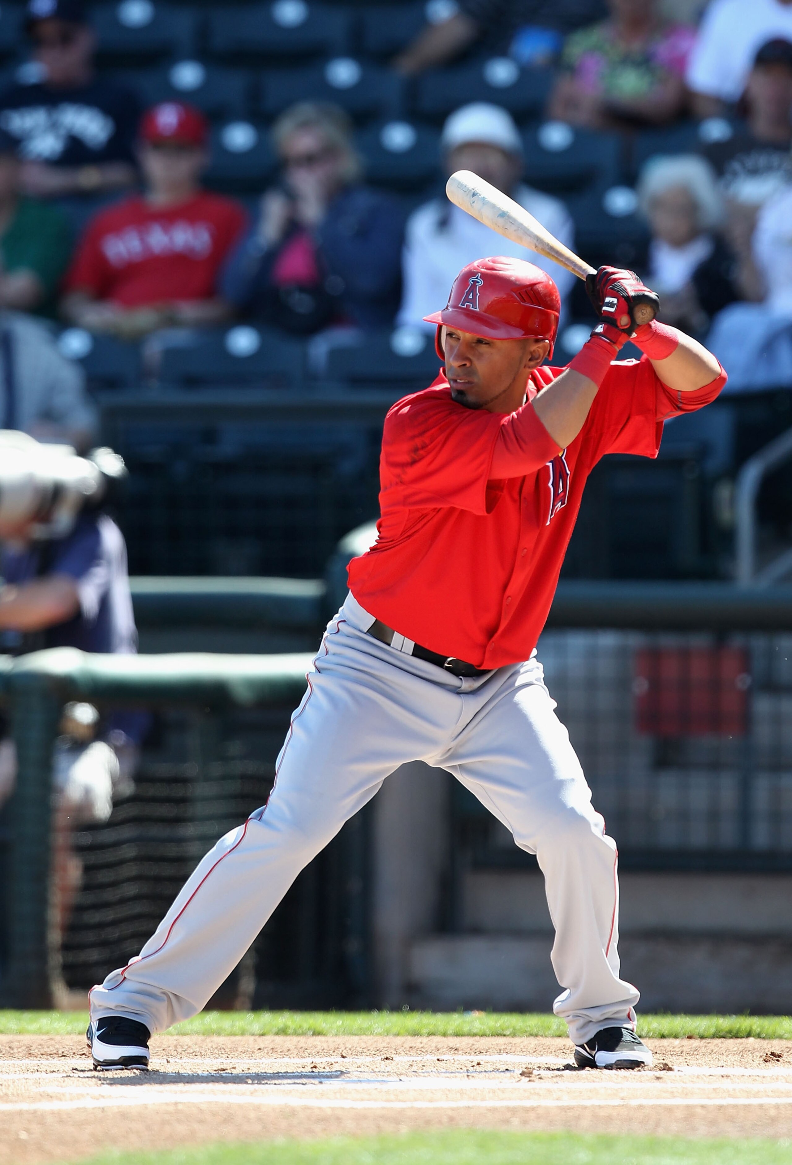 SURPRISE, AZ - MARCH 02:  Maicer Izturis #13 of the Los Angeles Angels of Anaheim bats against the Texas Rangers during the spring training game at Surprise Stadium on March 2, 2011 in Surprise, Arizona.  (Photo by Christian Petersen/Getty Images)