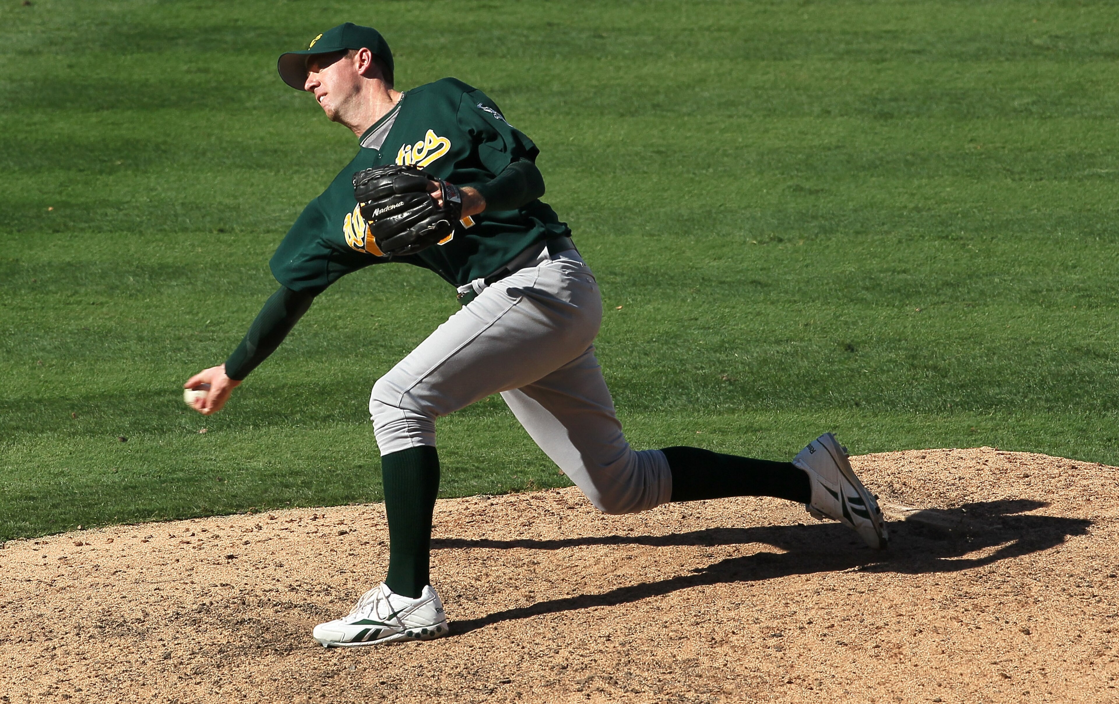 ANAHEIM, CA - SEPTEMBER 29: Reliever Brad Ziegler #31 of the Oakland Athletics throws a pitch against the Los Angeles Angels of Anaheim on September 29, 2010 at Angel Stadium in Anaheim, California. The Angels won 2-1 in 11 innings. (Photo by Stephen D ANAHEIM, CA - SEPTEMBER 29: Reliever Brad Ziegler #31 of the Oakland Athletics throws a pitch against the Los Angeles Angels of Anaheim on September 29, 2010 at Angel Stadium in Anaheim, California. The Angels won 2-1 in 11 innings. (Photo by Stephen D
