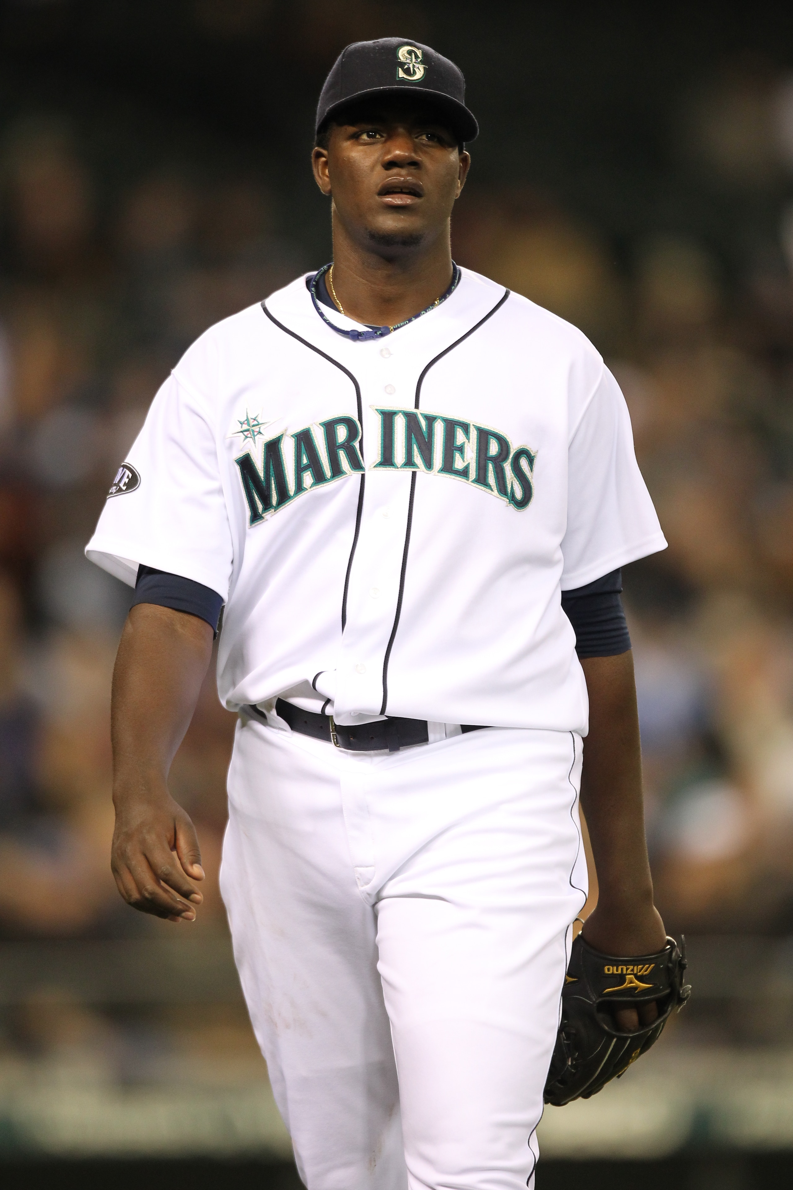 SEATTLE, WA - APRIL 12:  Starting pitcher Michael Pineda #36 of the Seattle Mariners walks back to the dugout after retiring the side during the game against the Toronto Blue Jays at Safeco Field on April 12, 2011 in Seattle, Washington. (Photo by Otto Gr