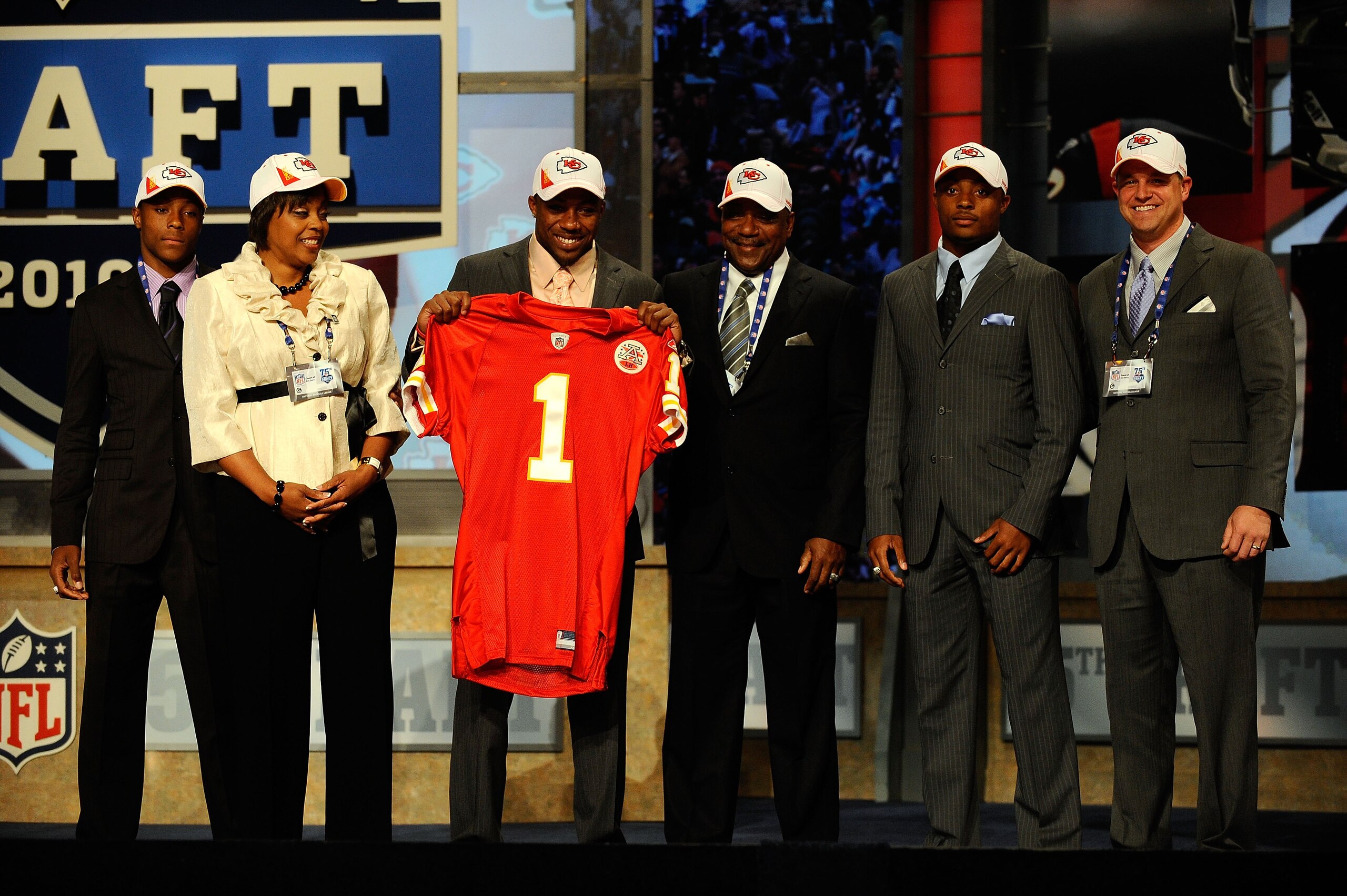 NEW YORK - APRIL 22:  Eric Berry from the Tennessee Volunteers holds a Kansas City Chiefs jersey as he poses with family and friends after the Chiefs selected Berry #5 overall in the first round of the 2010 NFL Draft at Radio City Music Hall on April 22,